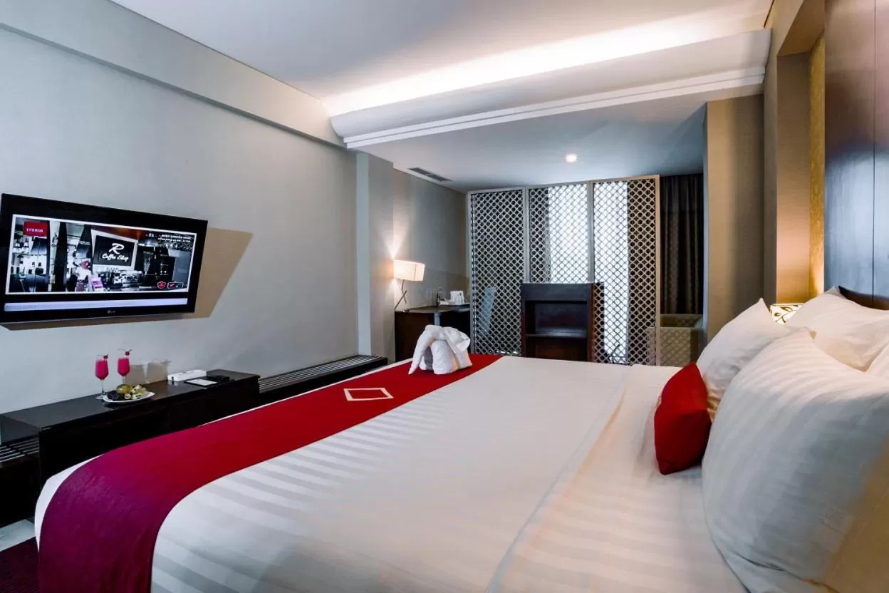 Bed in Emersia Hotel and Resort
