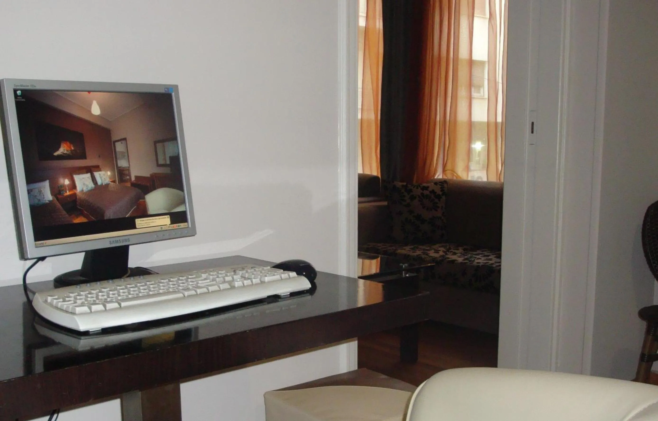 Communal lounge/ TV room in Ambrosia Suites