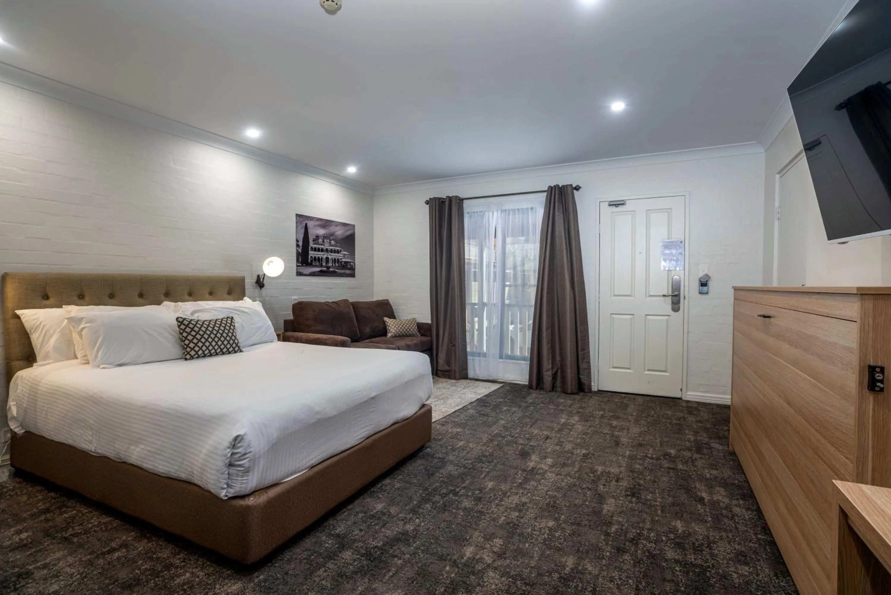 Bed in Town Square Motel