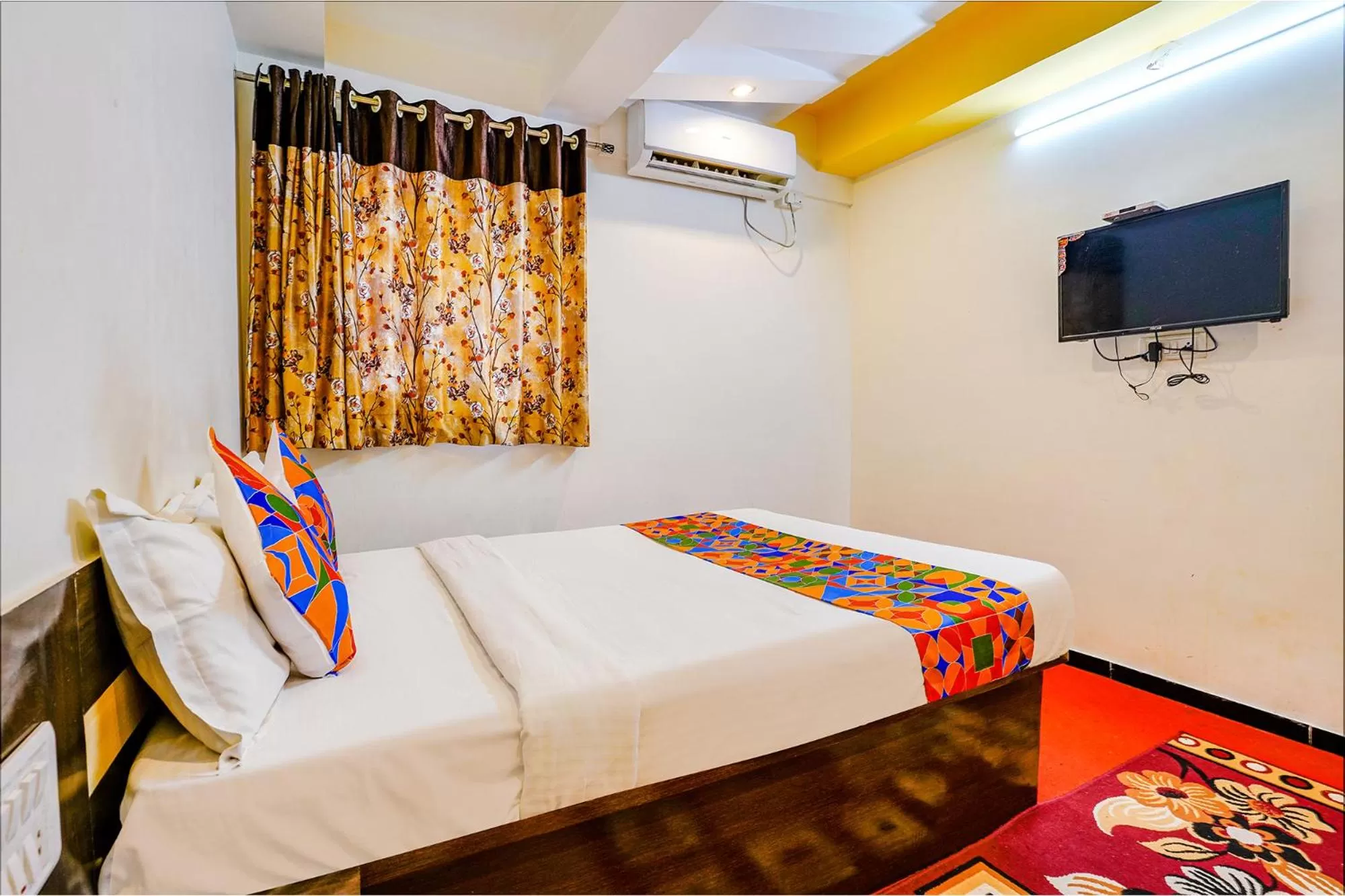 Bed in FabHotel Sai Chatra