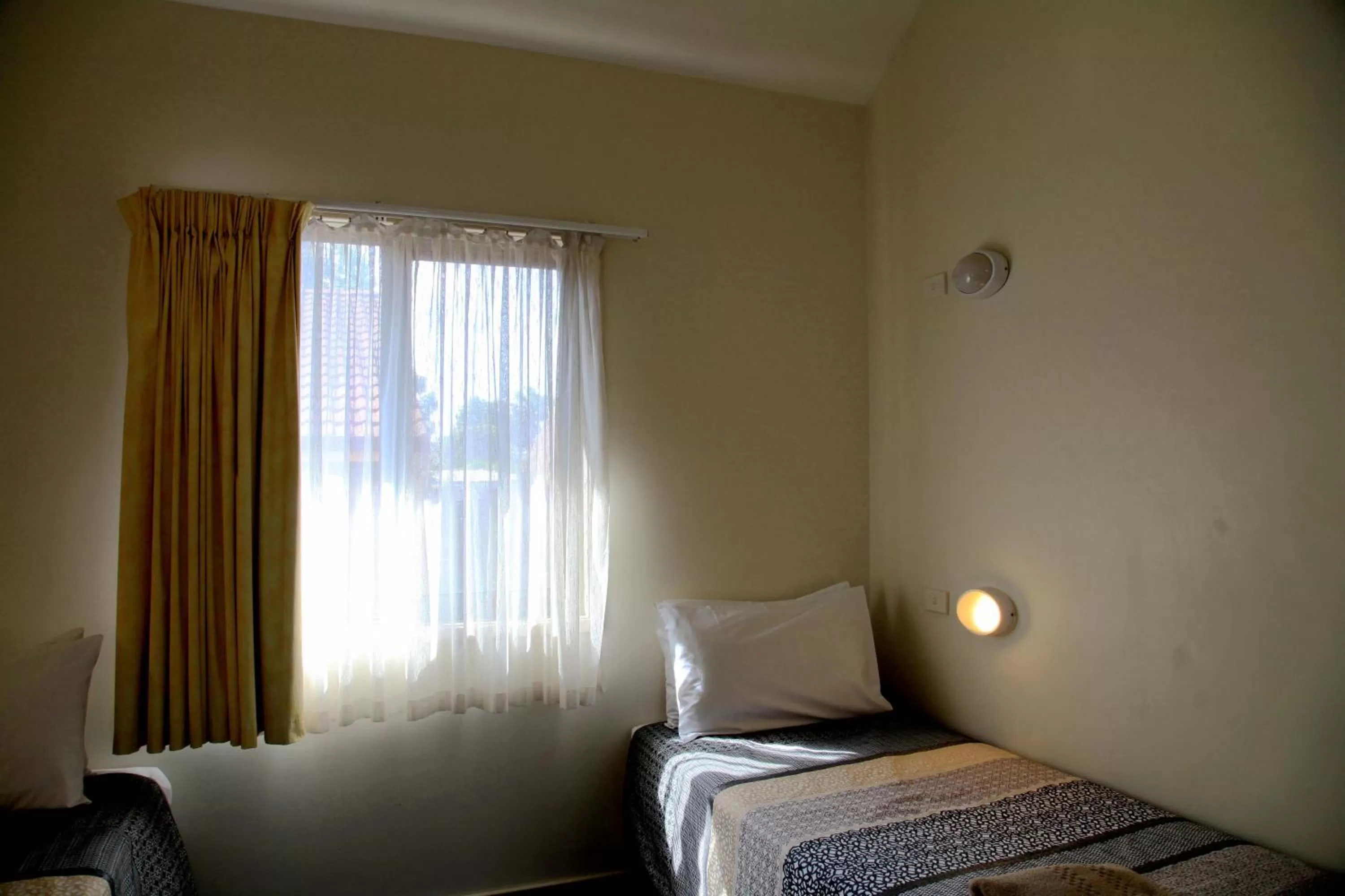 Bed in Travellers Motor Village