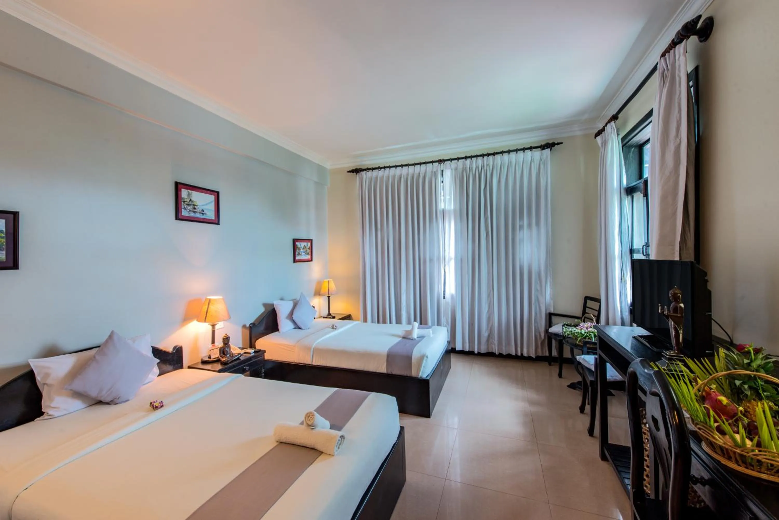 Photo of the whole room, Bed in Angkor Panoramic Boutique Hotel