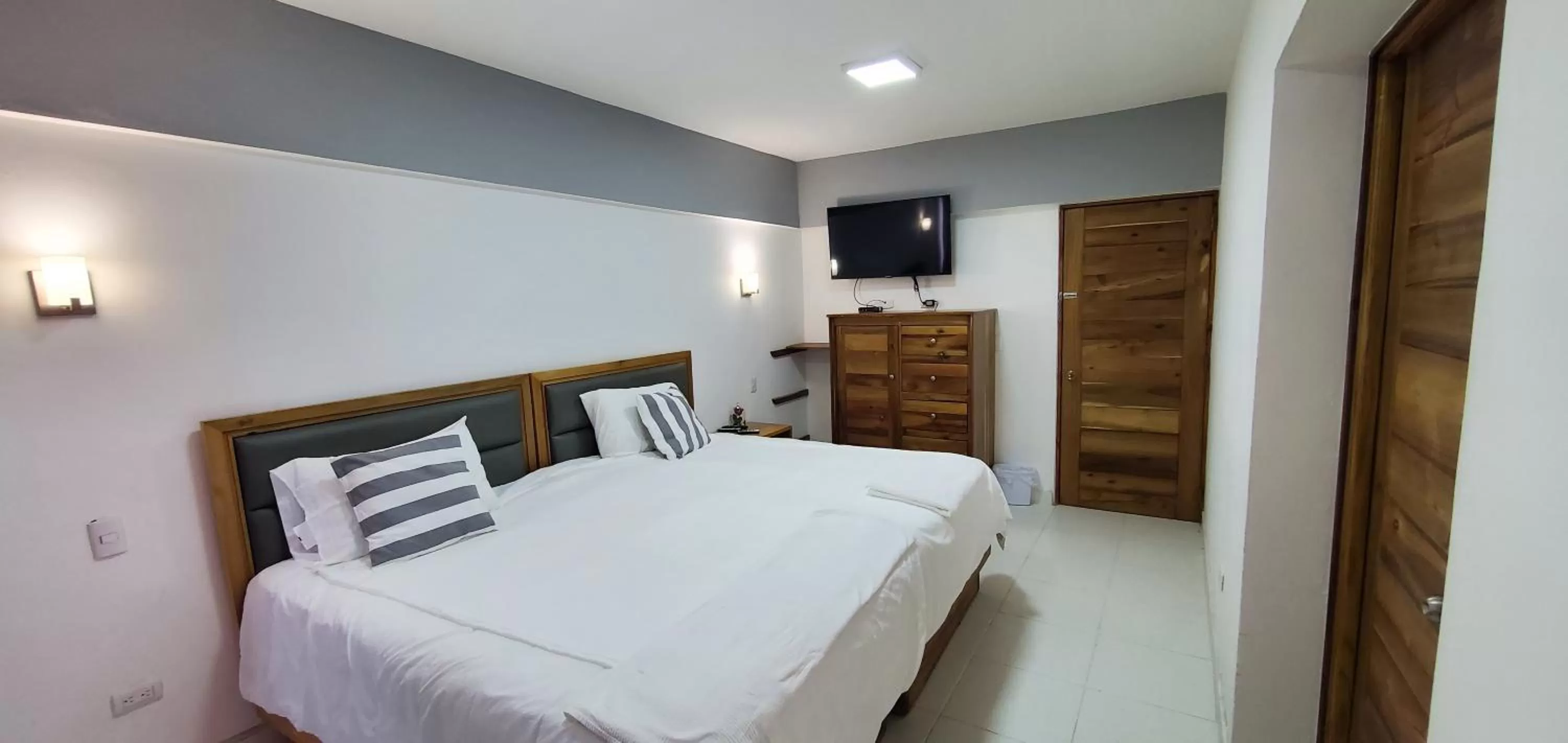 Bed in Boca Grande Hotel Suites