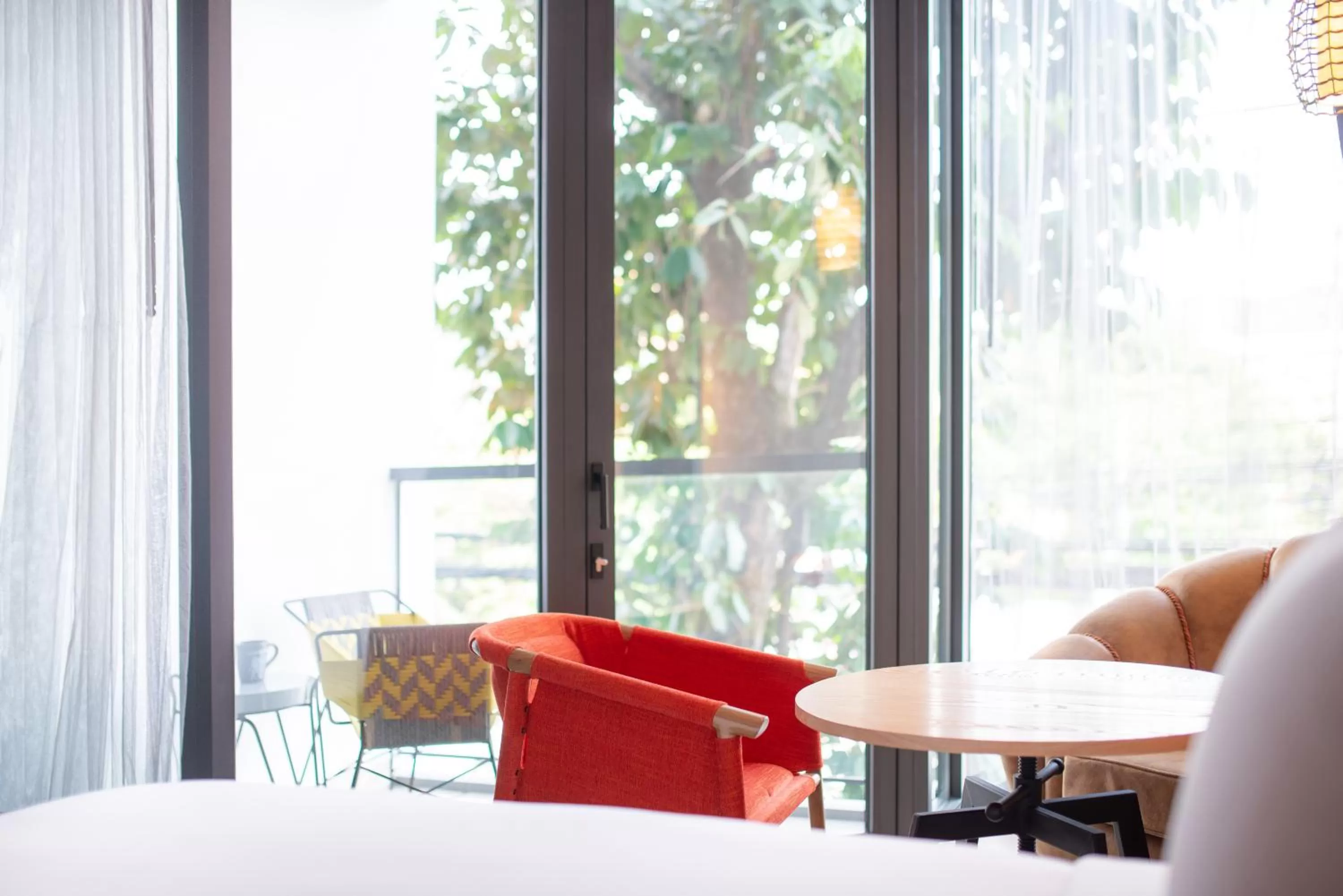 Seating area in Hotel Indigo Phuket Patong by IHG