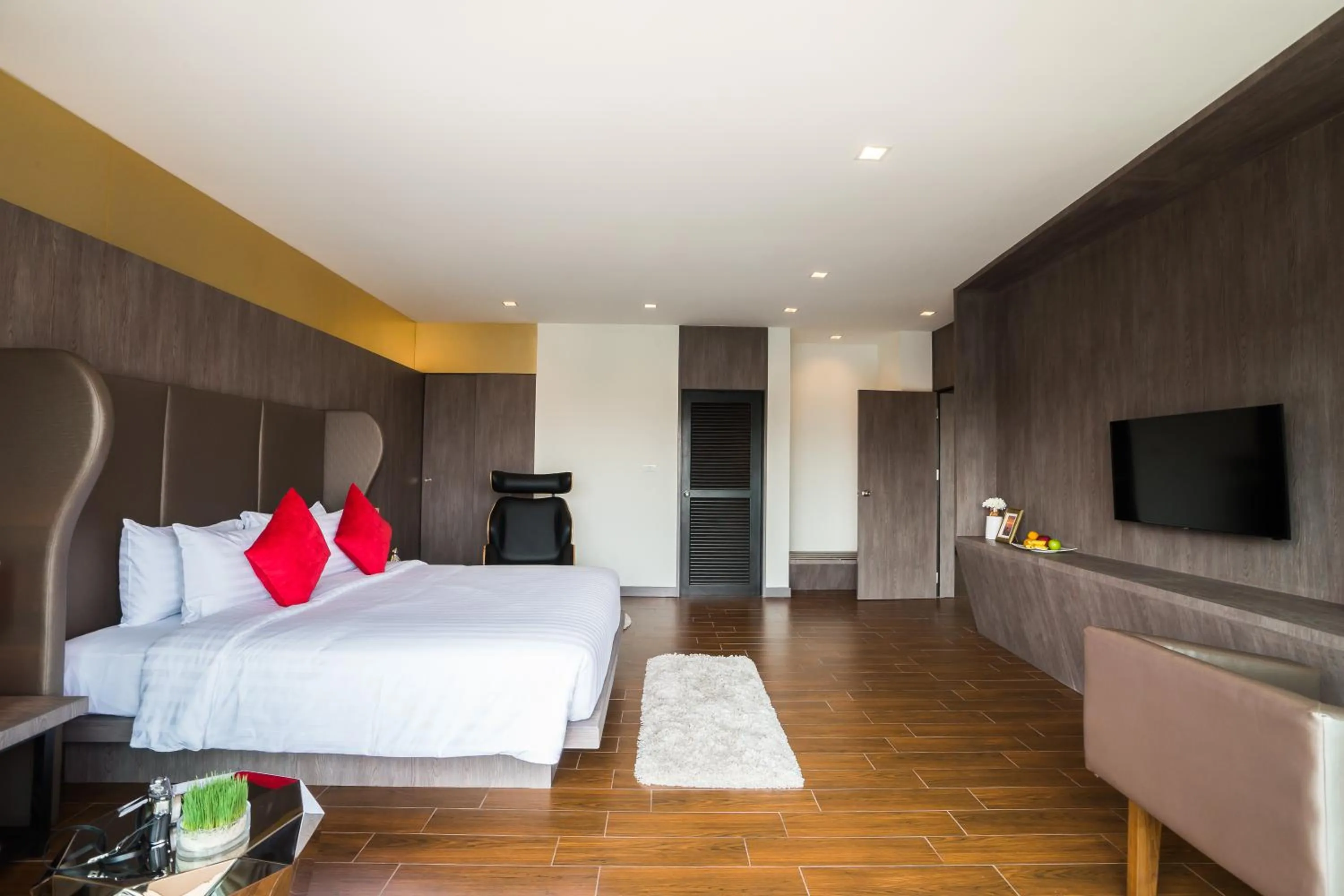 Bed in J Inspired Hotel Pattaya