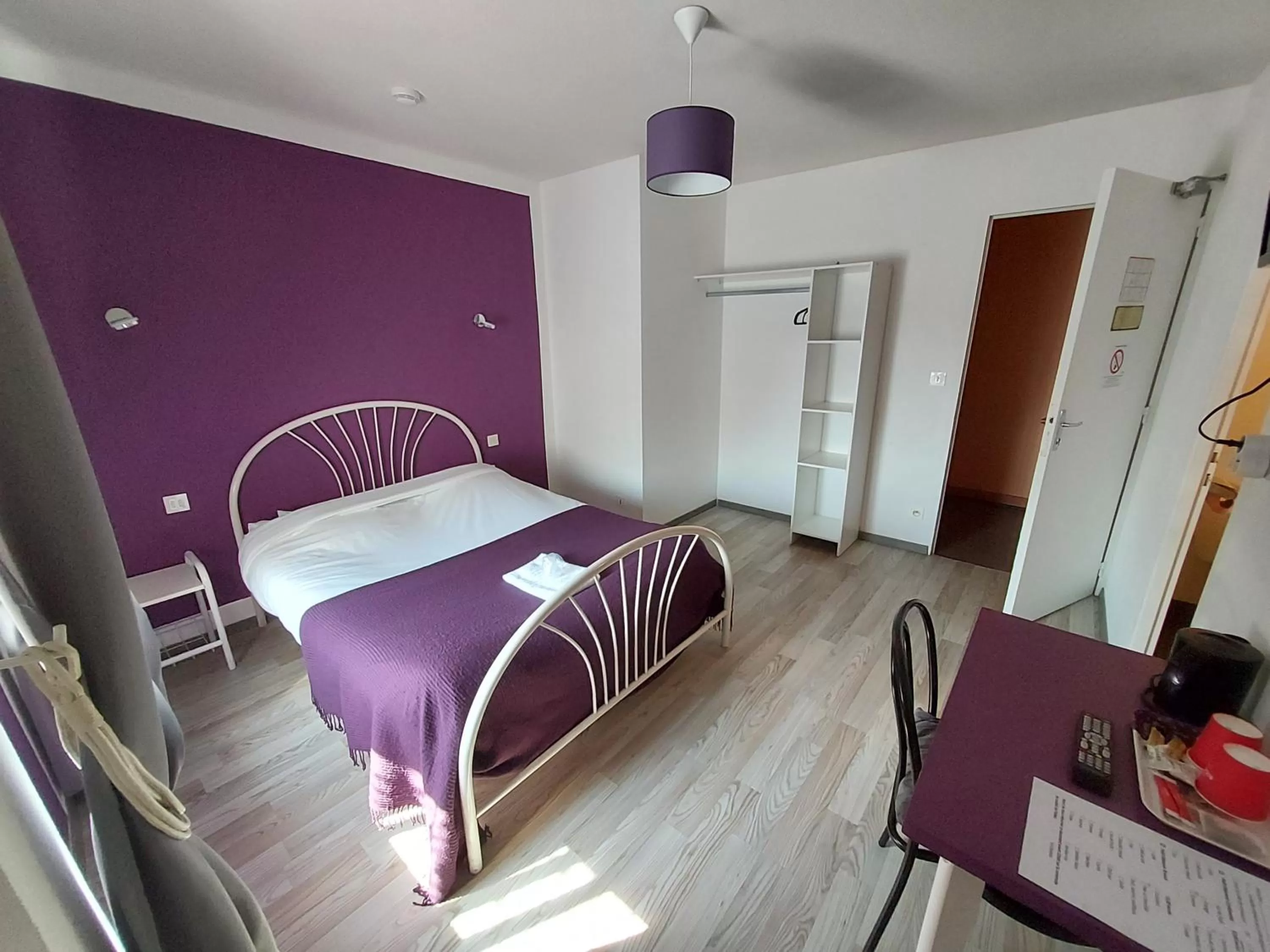 Photo of the whole room in Hôtel le Comtois