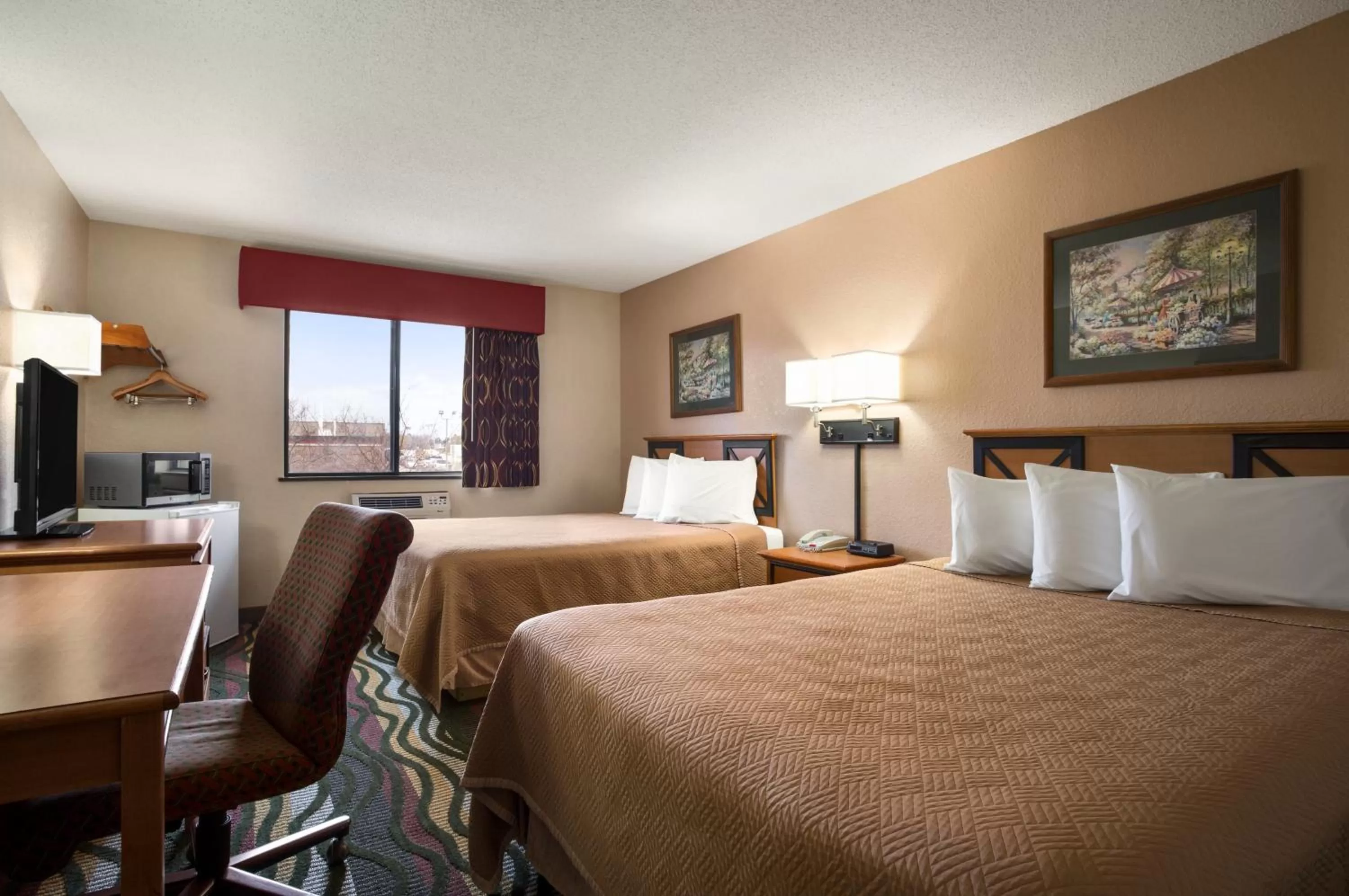 Photo of the whole room, Bed in Travelodge by Wyndham Battle Creek