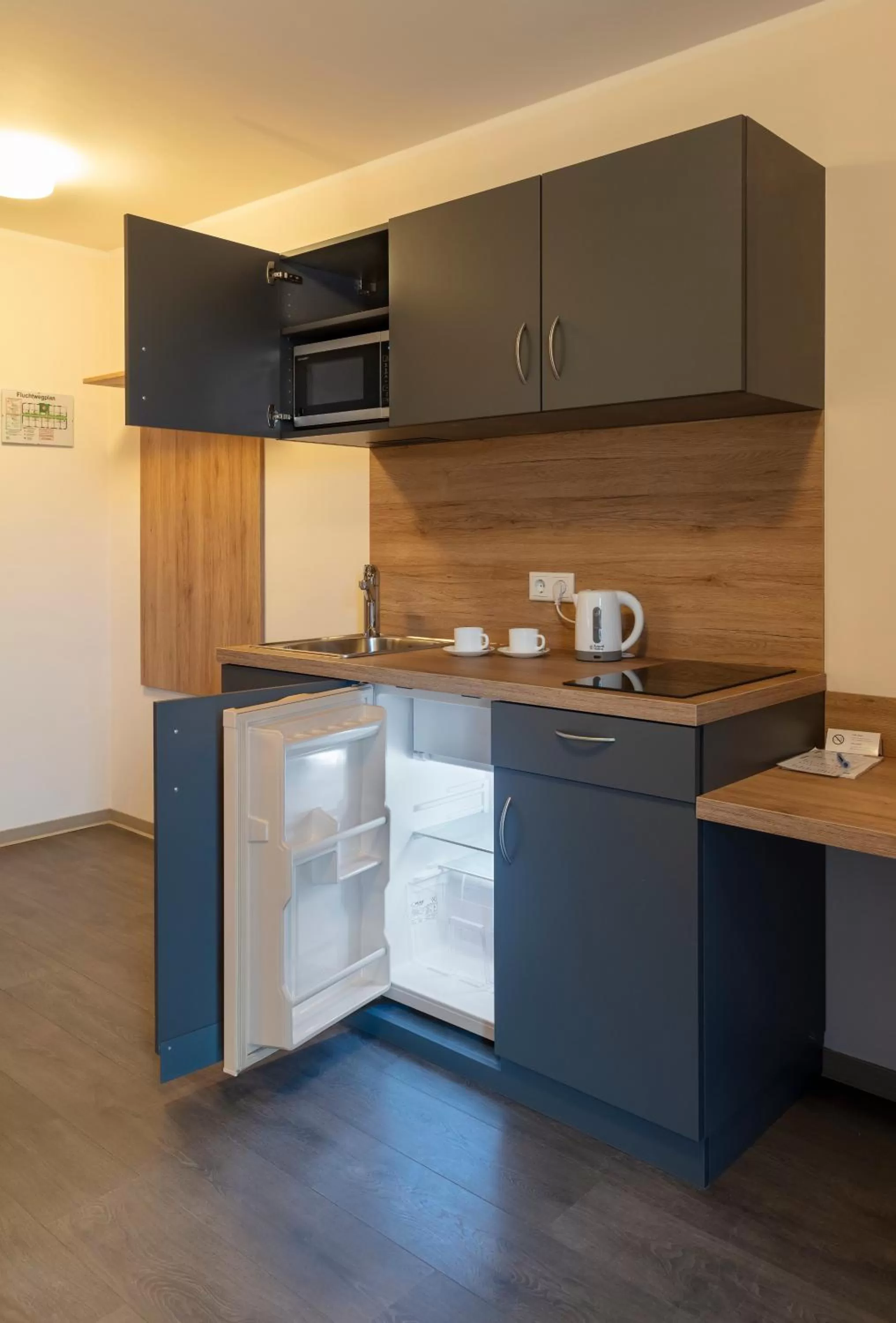Kitchen or kitchenette in Dominik Hotel & Eventsaal