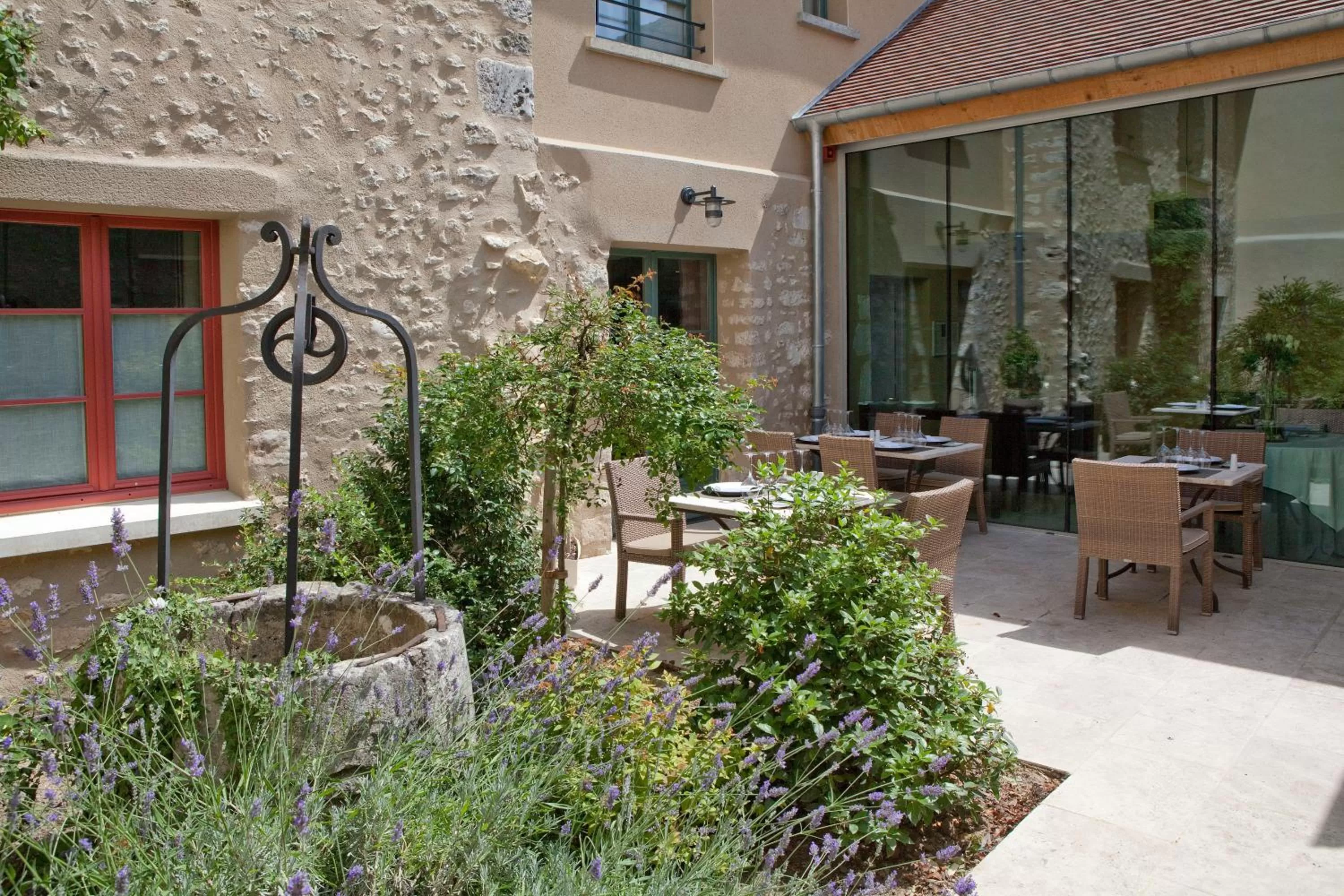Balcony/Terrace in Hôtel Aux Vieux Remparts, The Originals Relais