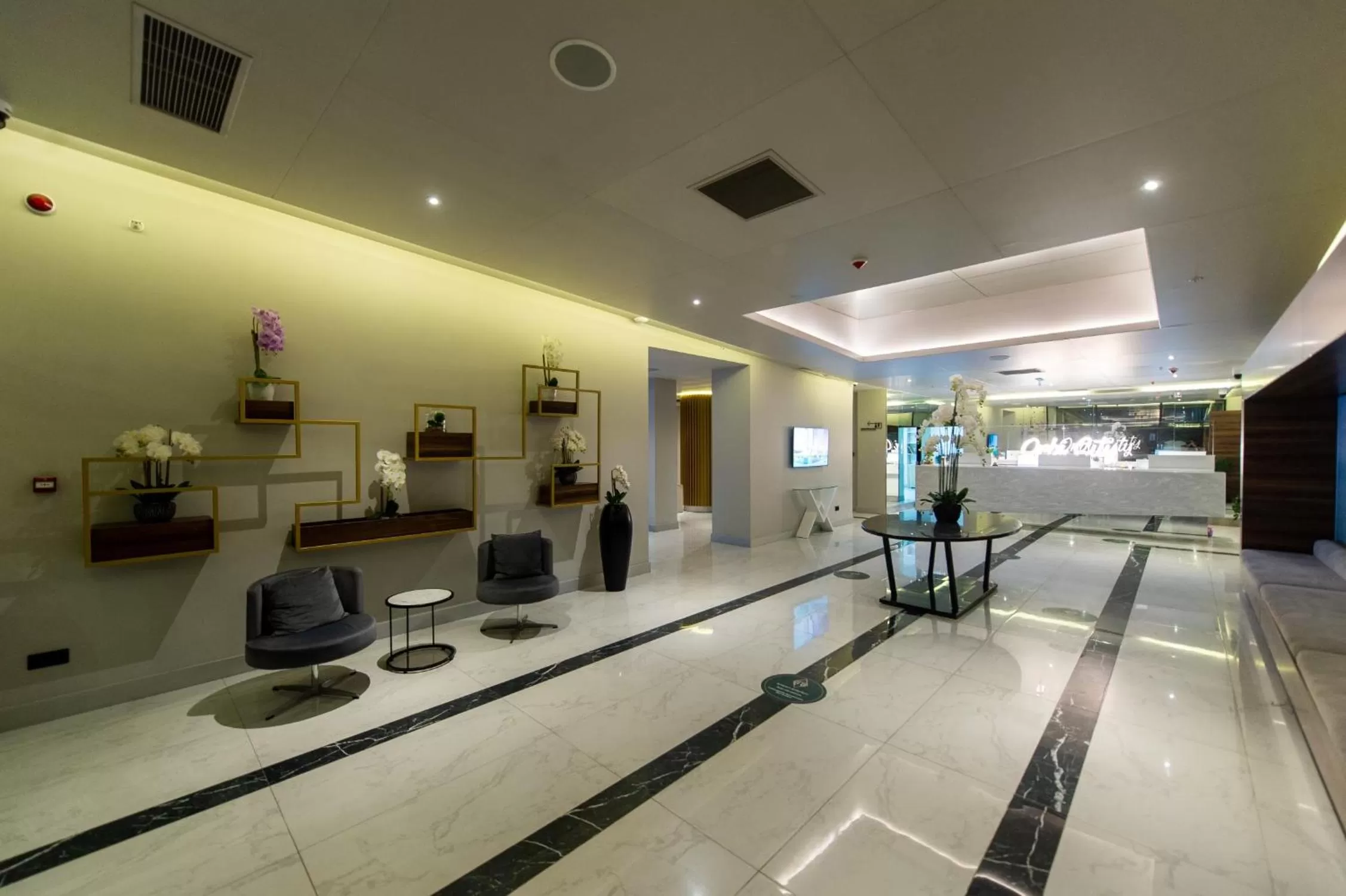 Lobby or reception in Orbi City Business Class Aparthotel