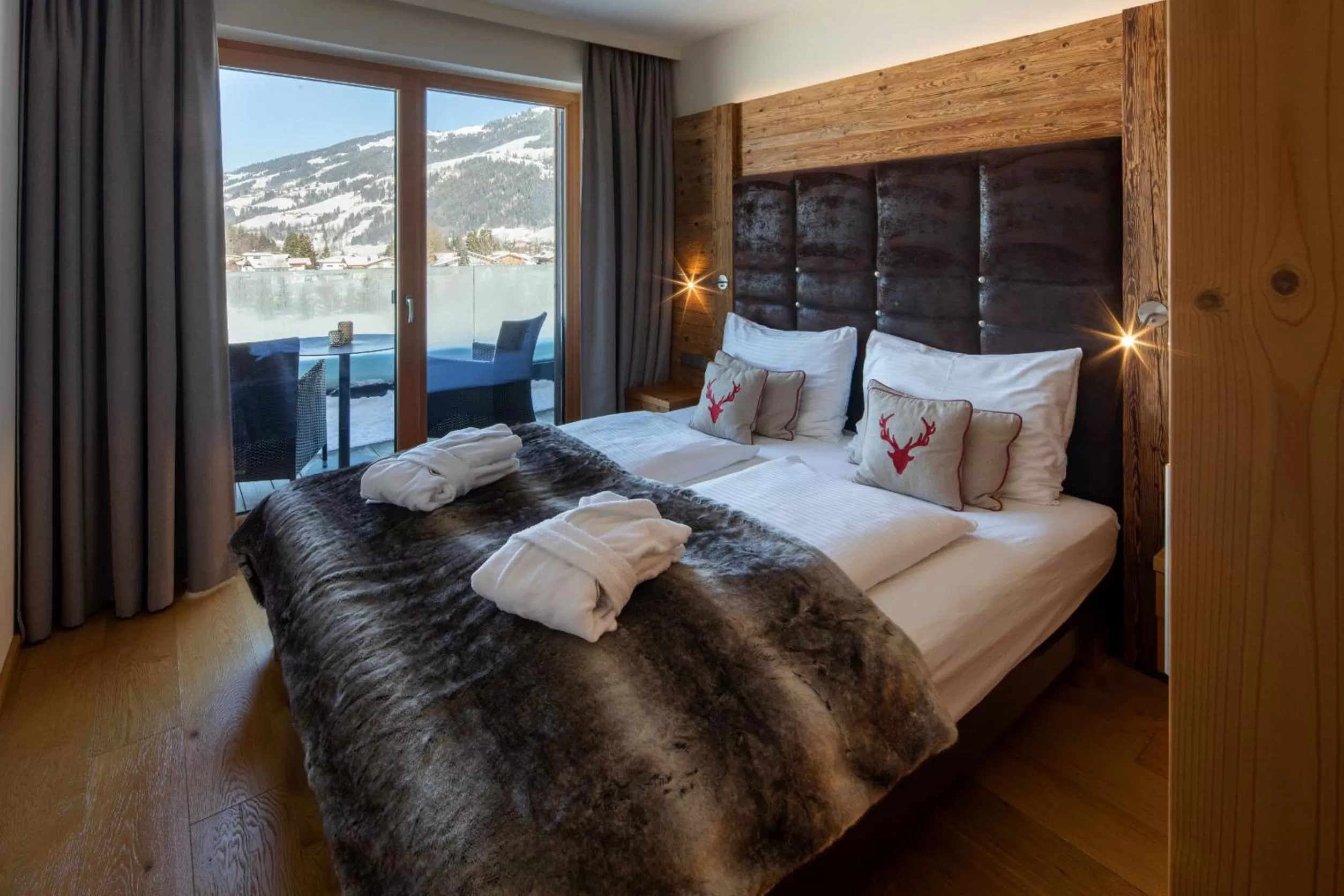 Photo of the whole room, Bed in Berg & Golf Resort Westendorf by ALPS RESORTS