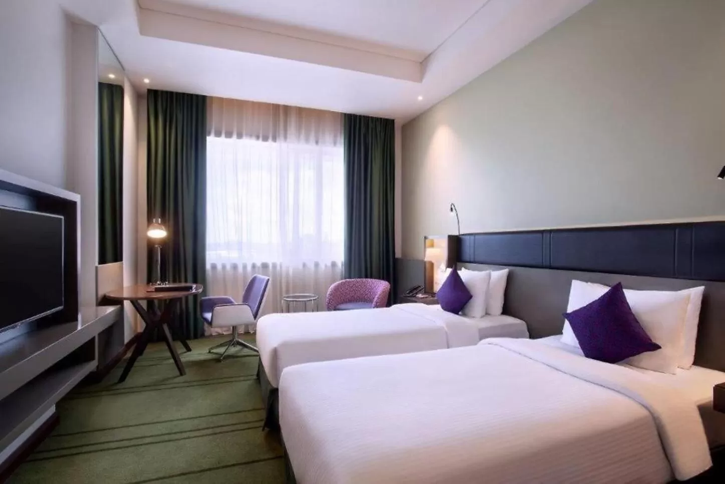 Bed in Avangio Hotel