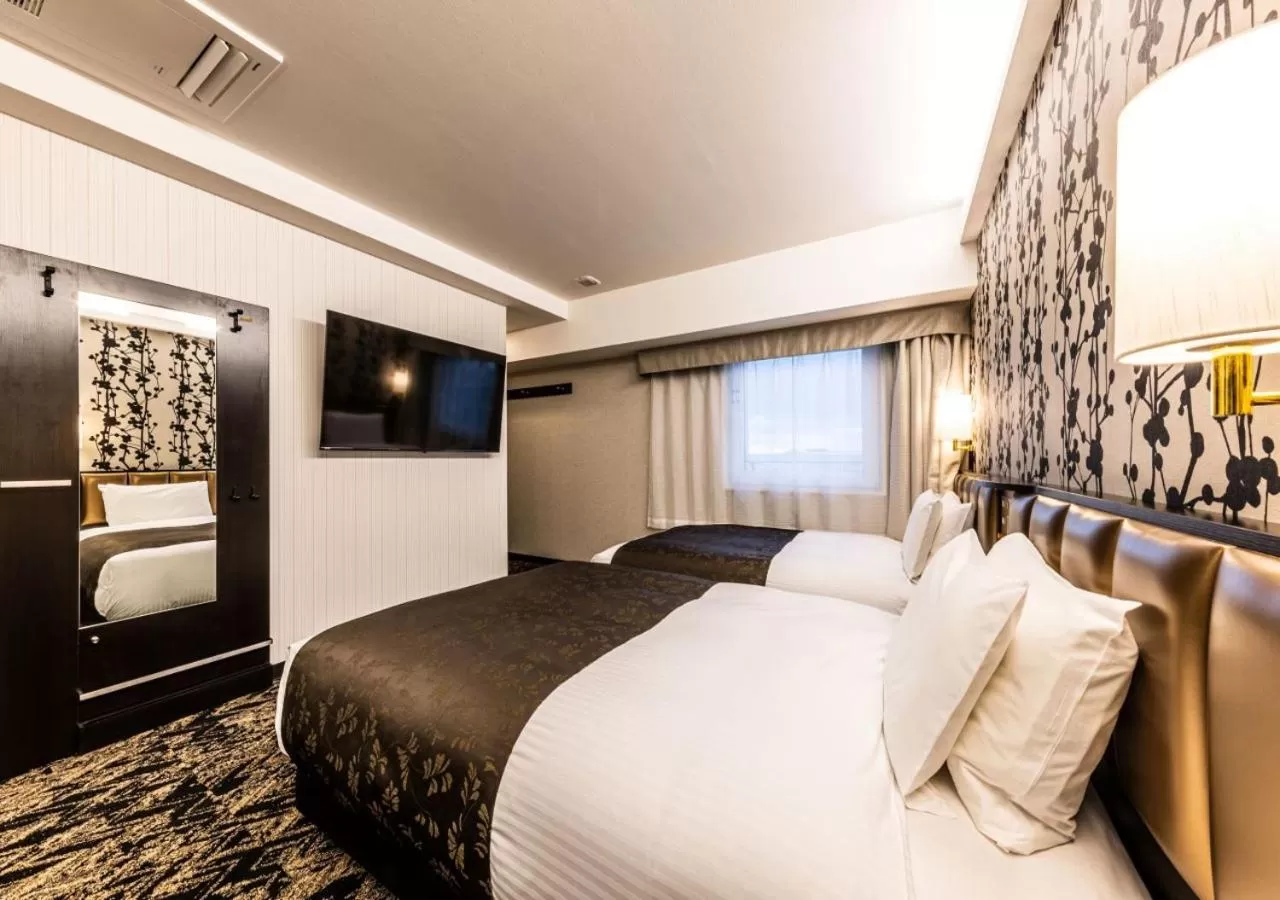 Photo of the whole room, Bed in APA Hotel & Resort Osaka Umeda Eki Tower