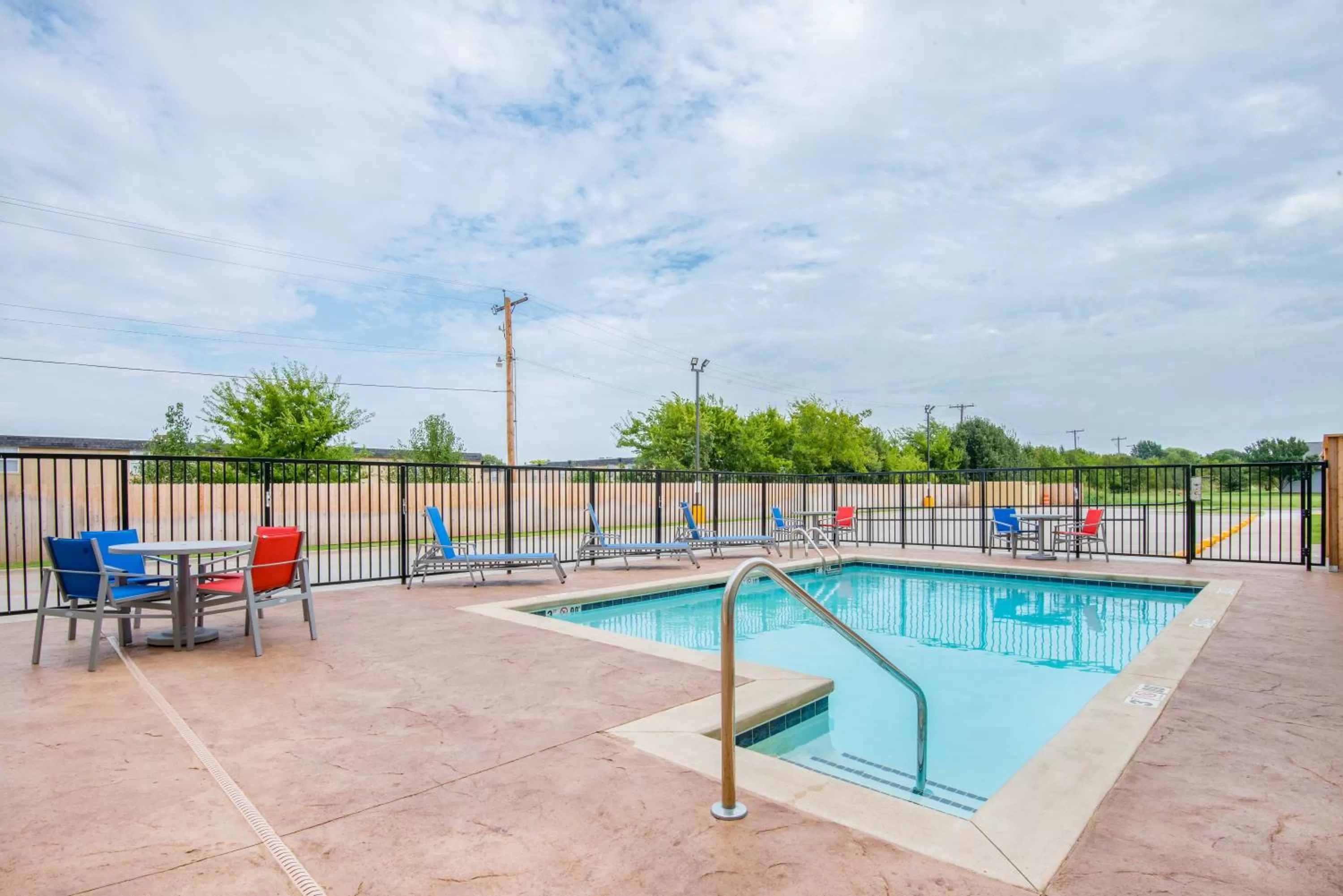 Swimming pool in Holiday Inn Express & Suites Stillwater - University Area by IHG