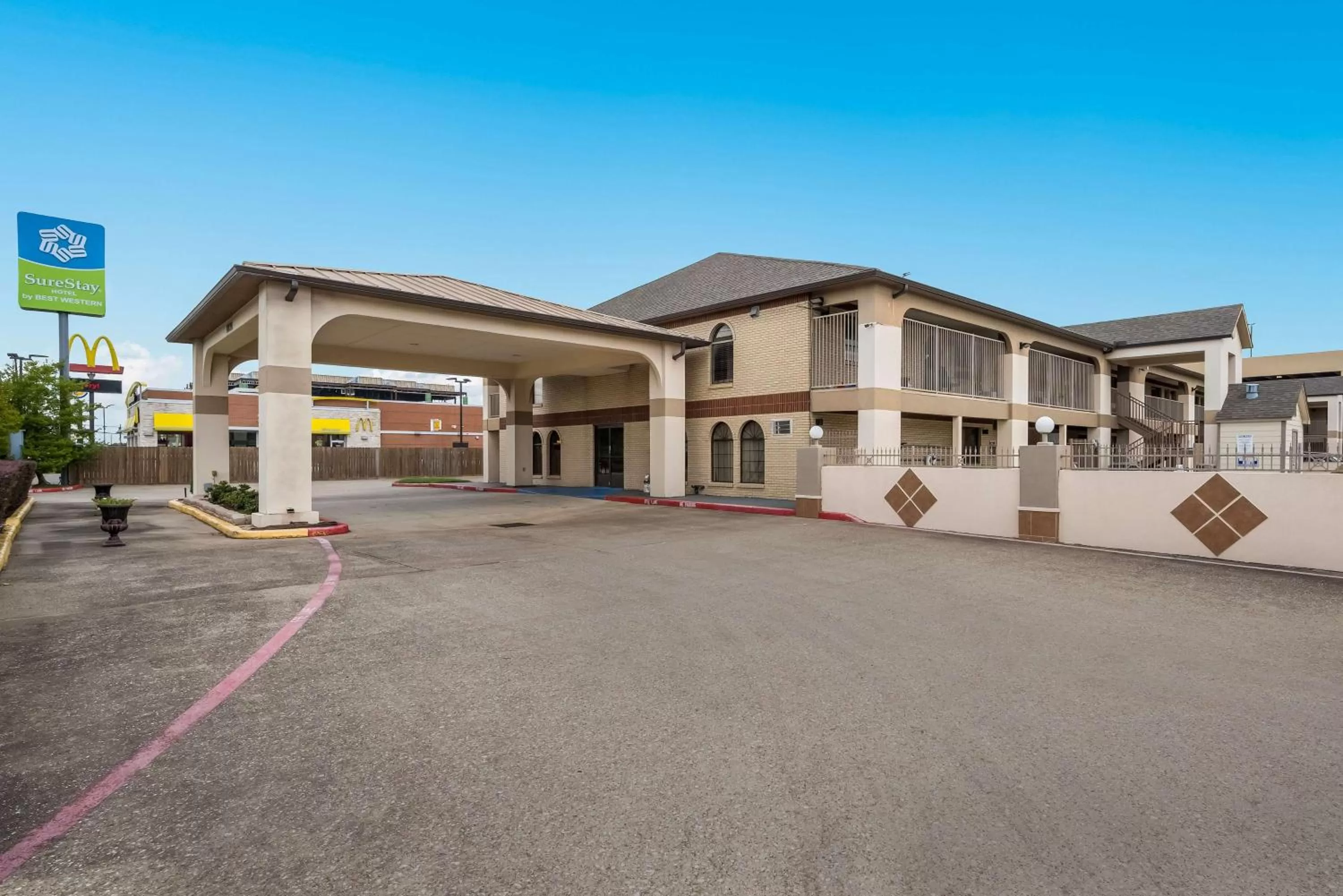 Property building in SureStay Hotel by Best Western Deer Park