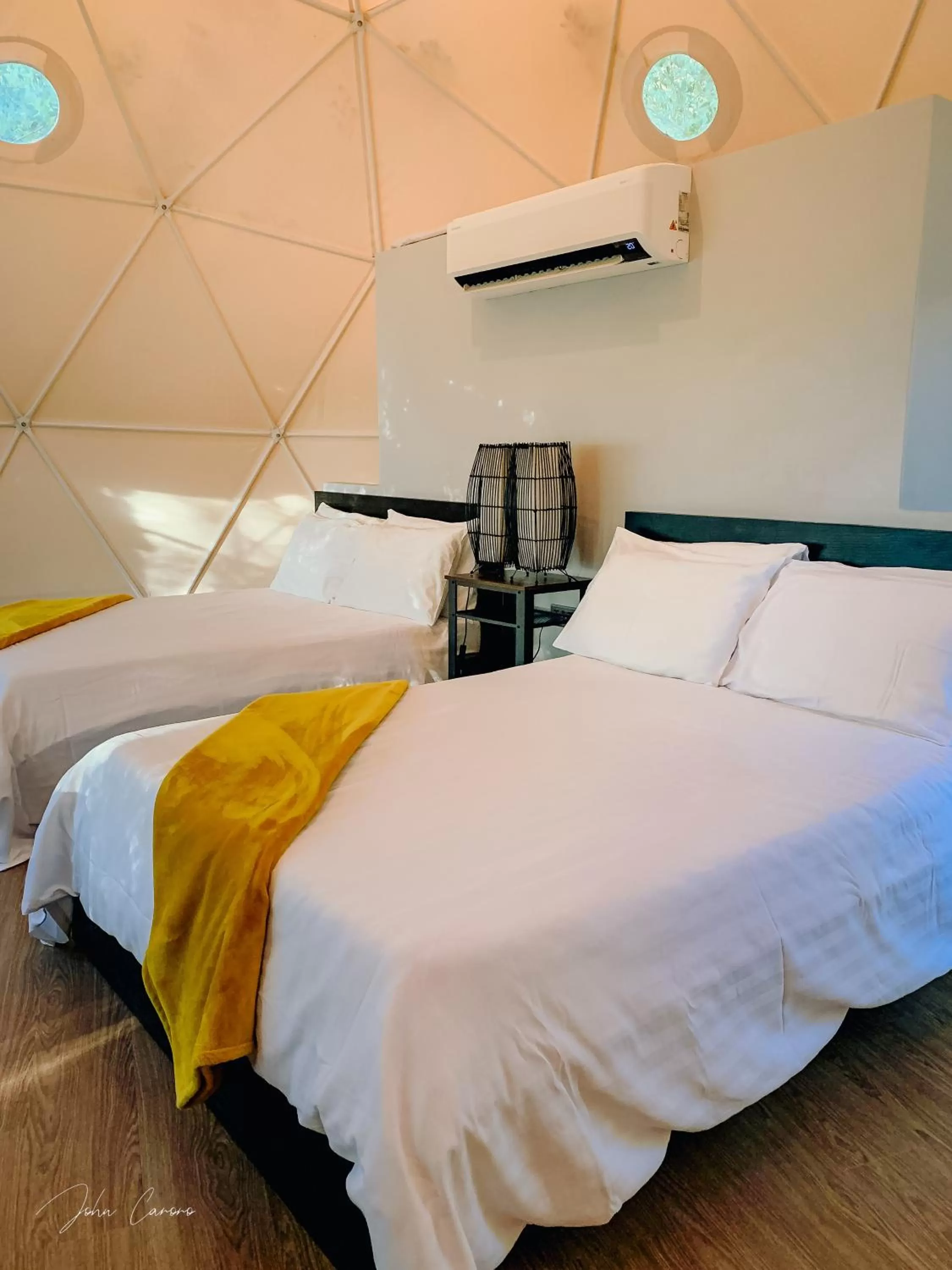 Bed in Aquamare Beach Camp Resort