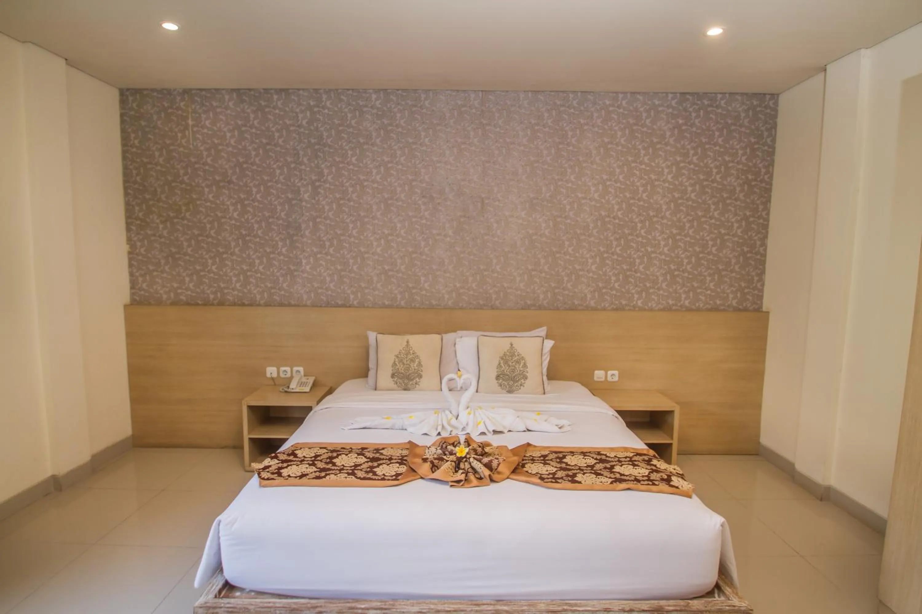 Bed in Mahalaksmi Boutique Hotel