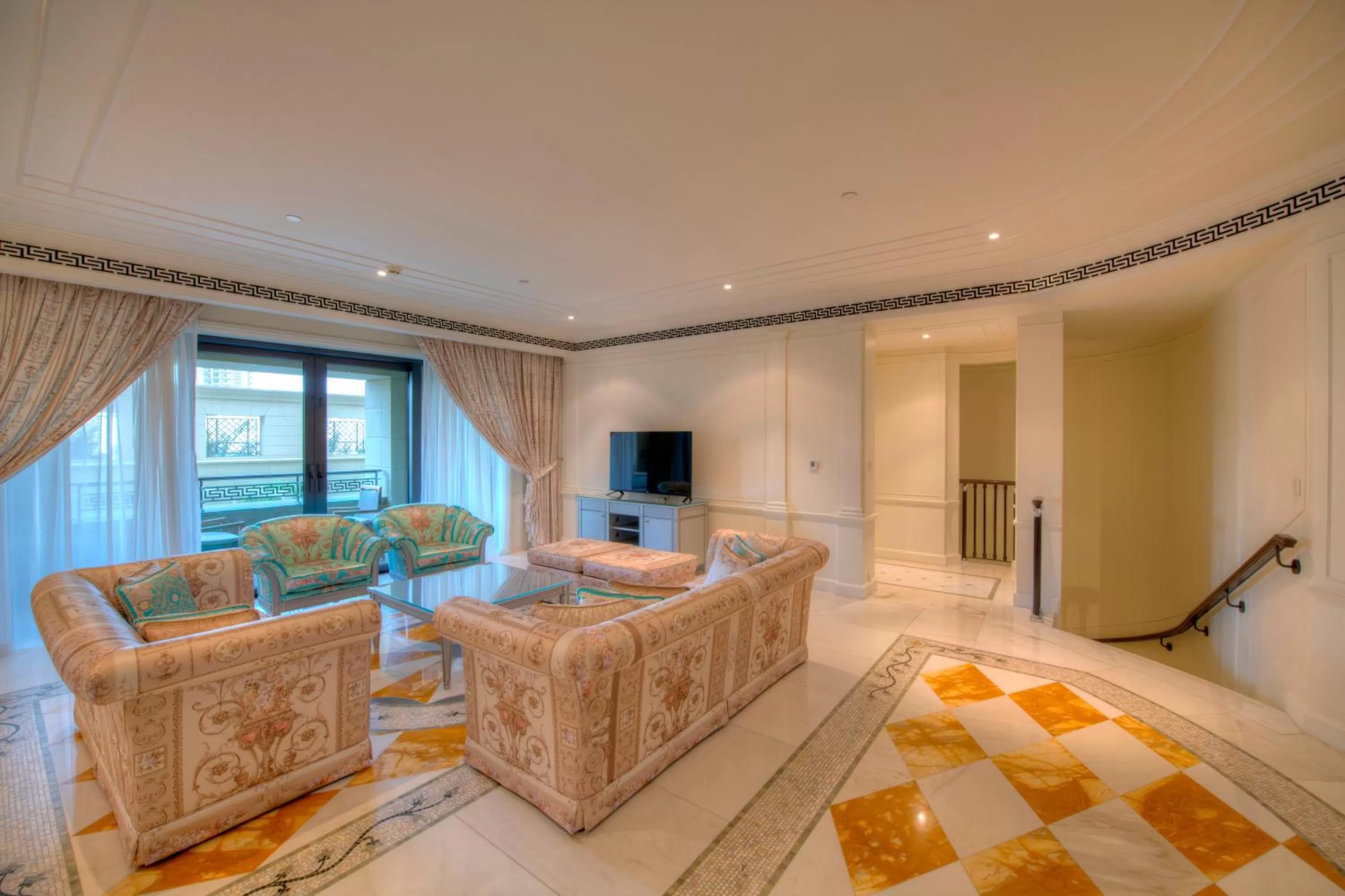 Living room, Bed in Palazzo Versace Dubai