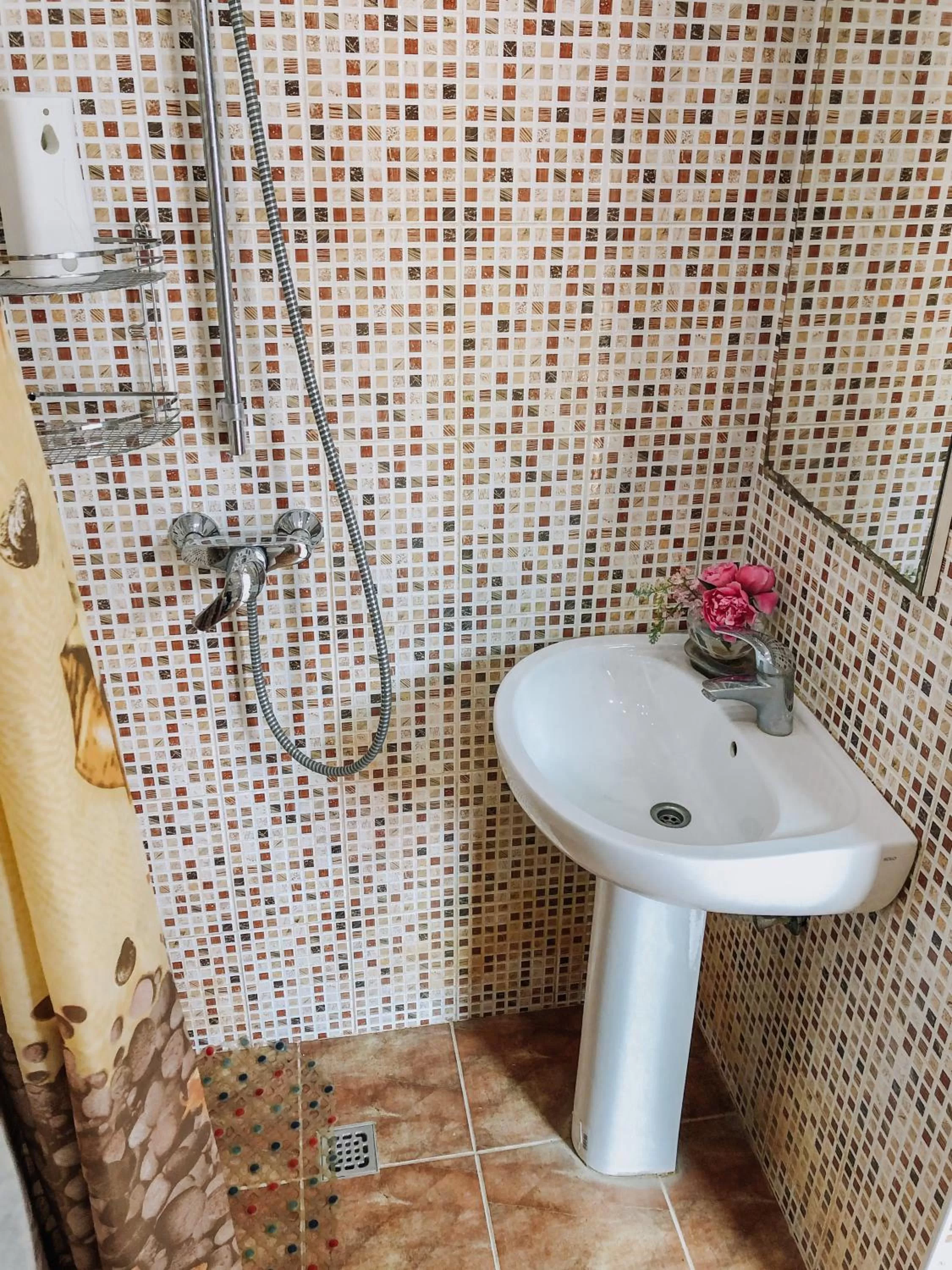 Bathroom in Zolotoy Bereg Hotel