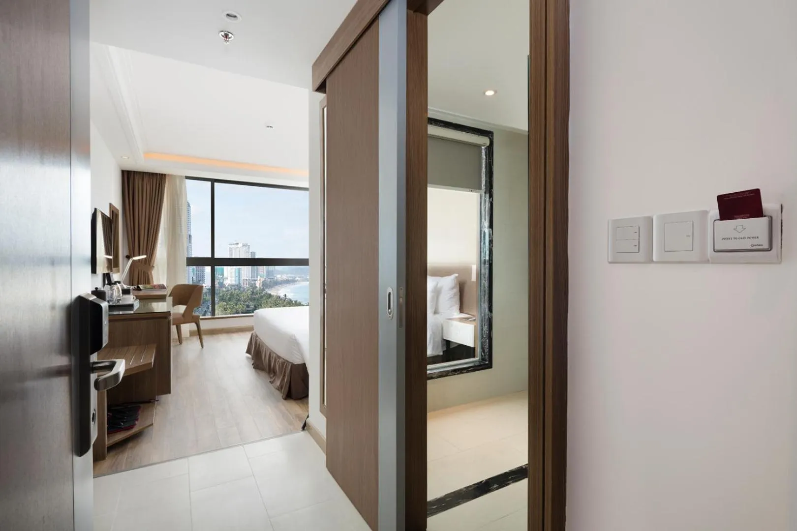 Photo of the whole room, Bed in Comodo Nha Trang Hotel