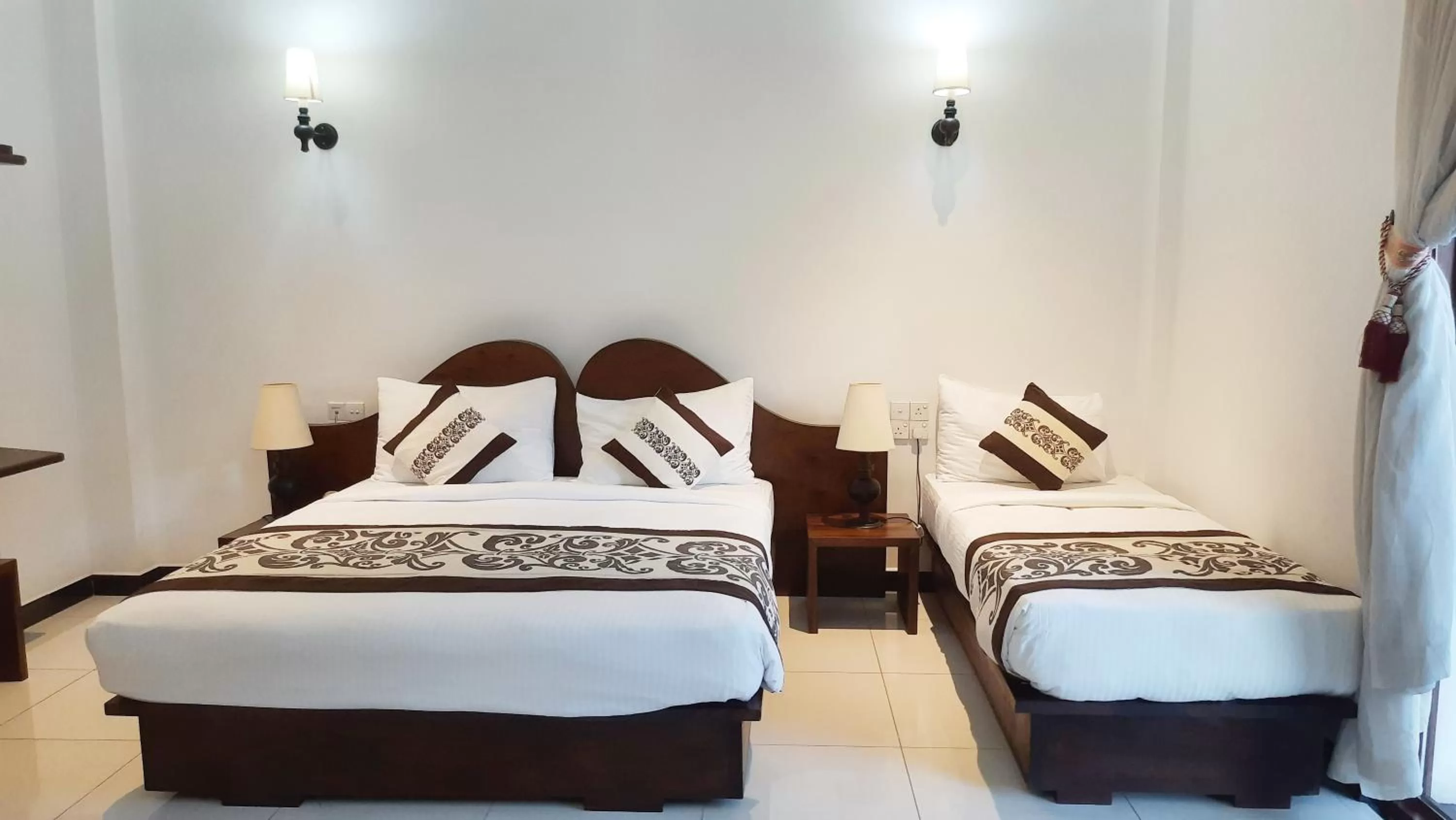 Bed in Royal Kandyan Hotel