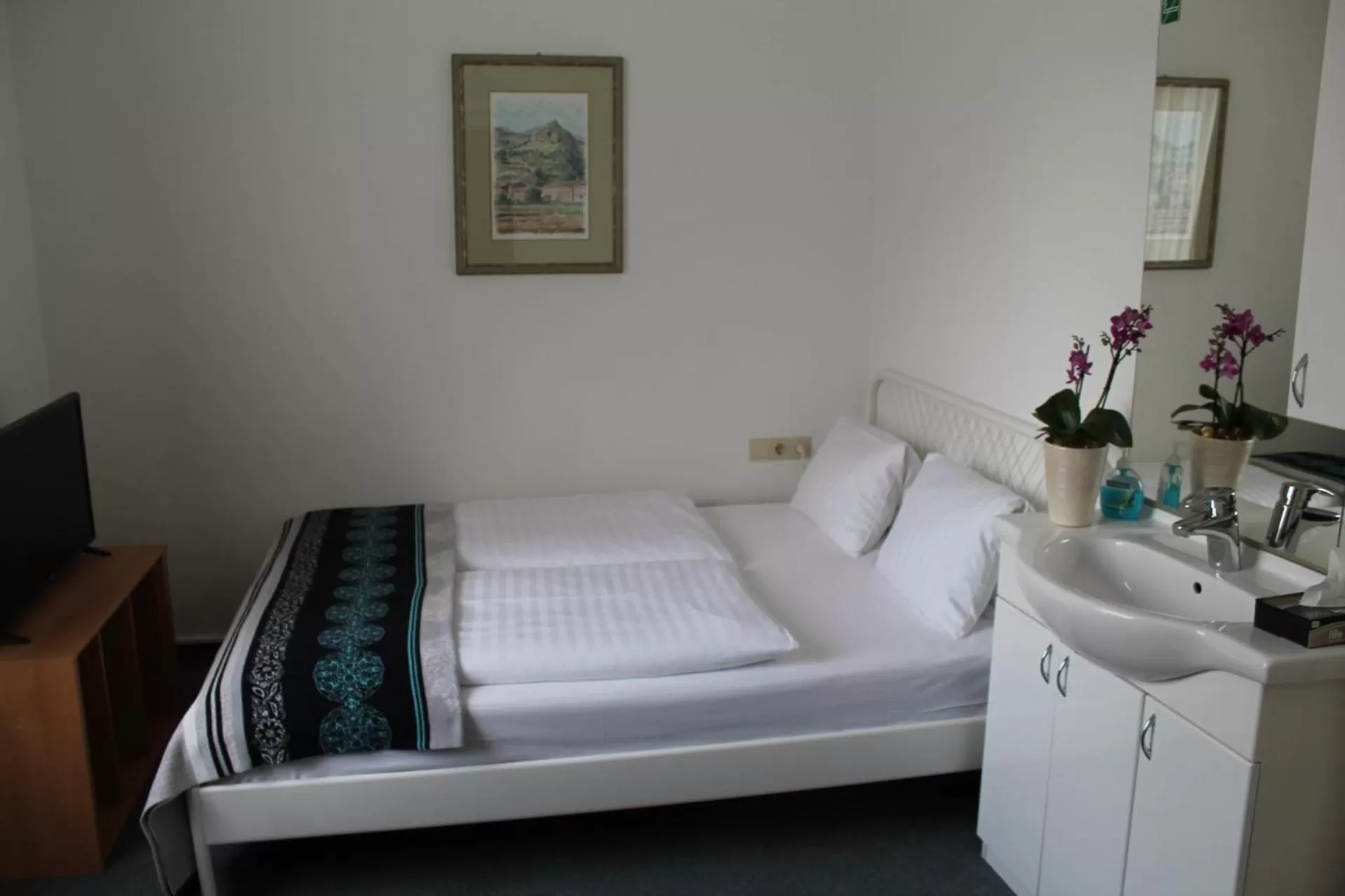 Bed in Hotel Goldene Krone Innsbruck