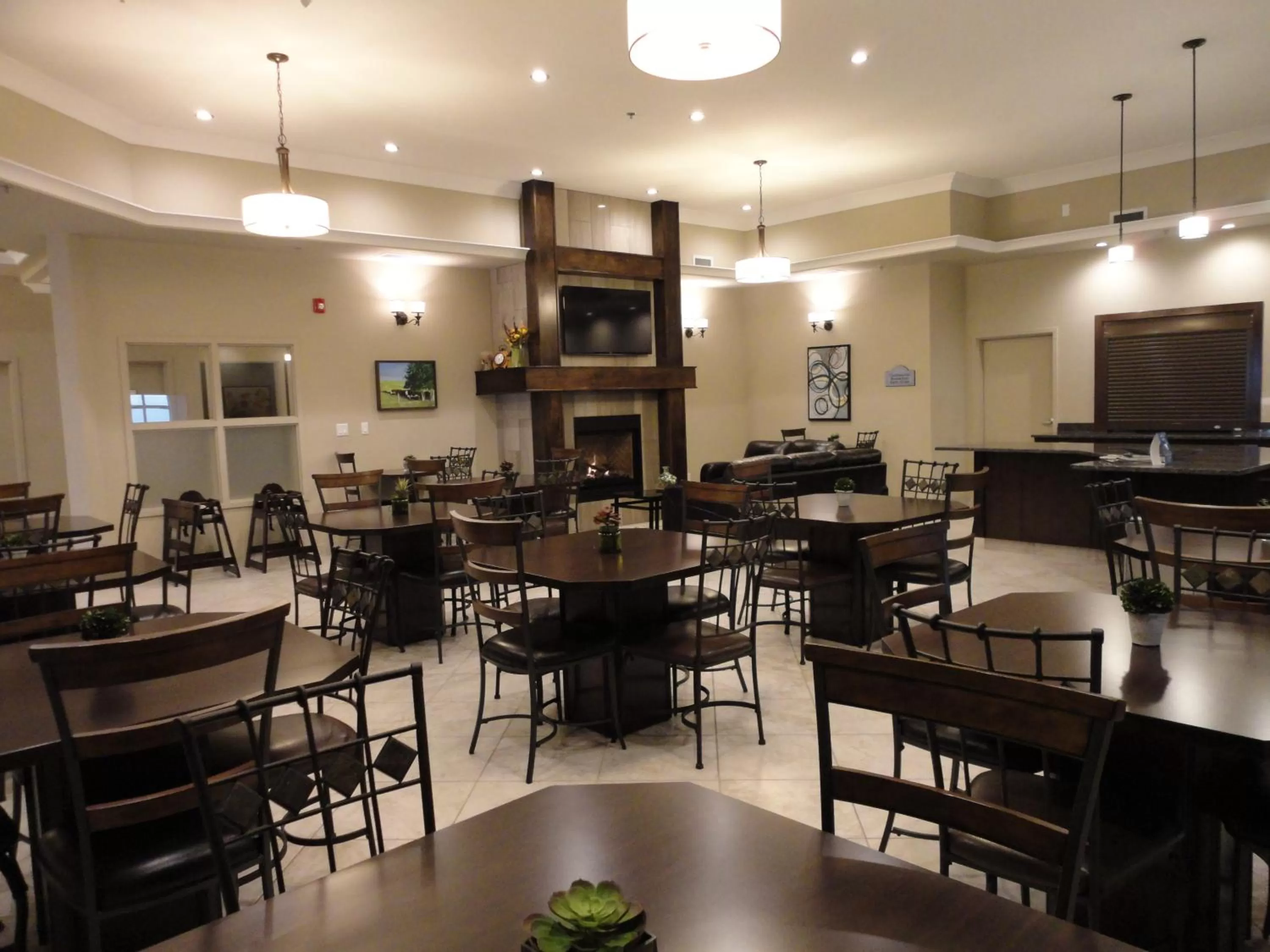 Lobby or reception in Ramada by Wyndham Emerald Park/Regina East
