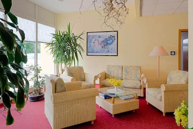 Communal lounge/ TV room in Sporthotel Malchow Hotel Garni HP ist möglich