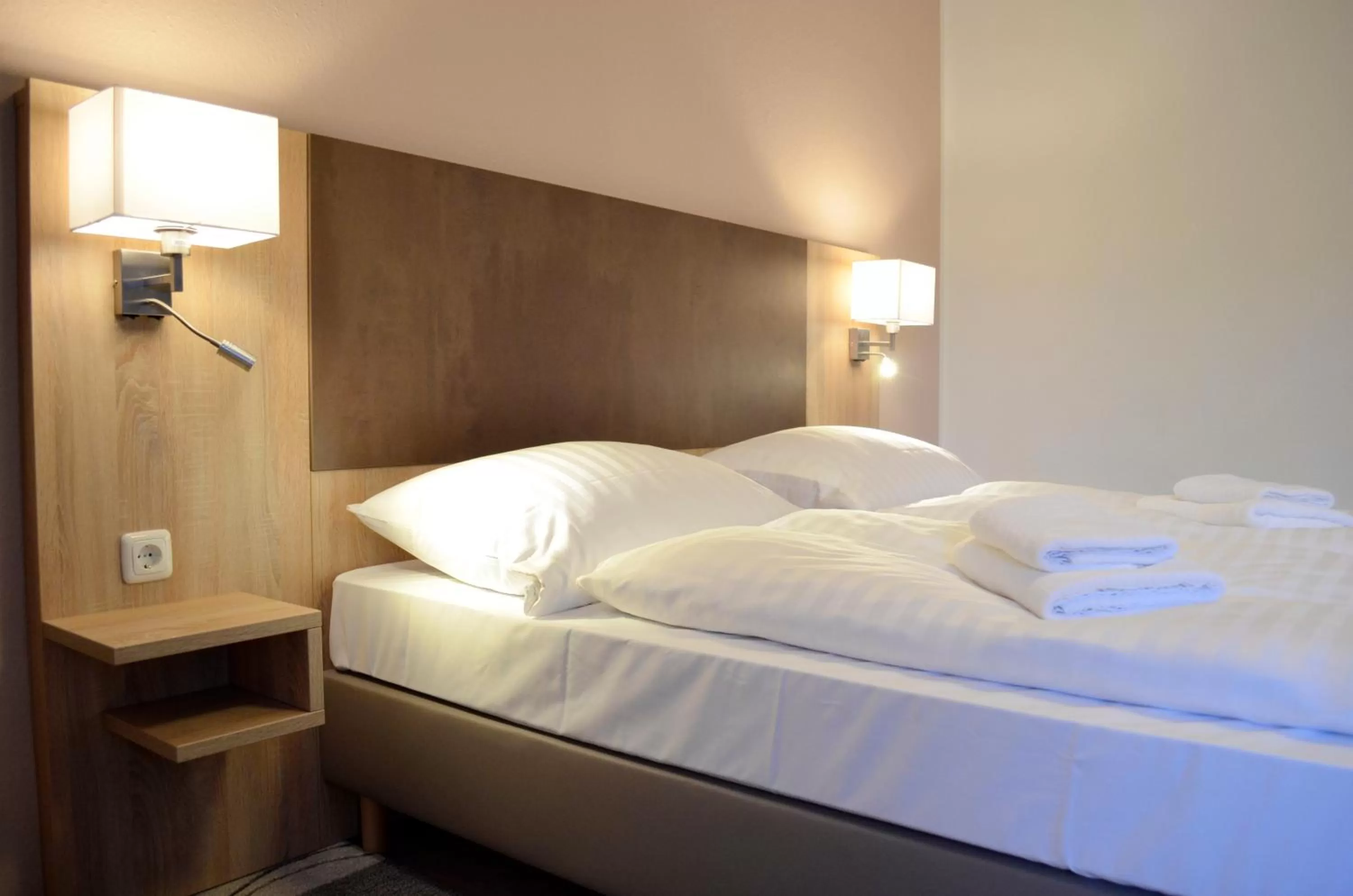 Bed in Hana Aparthotel