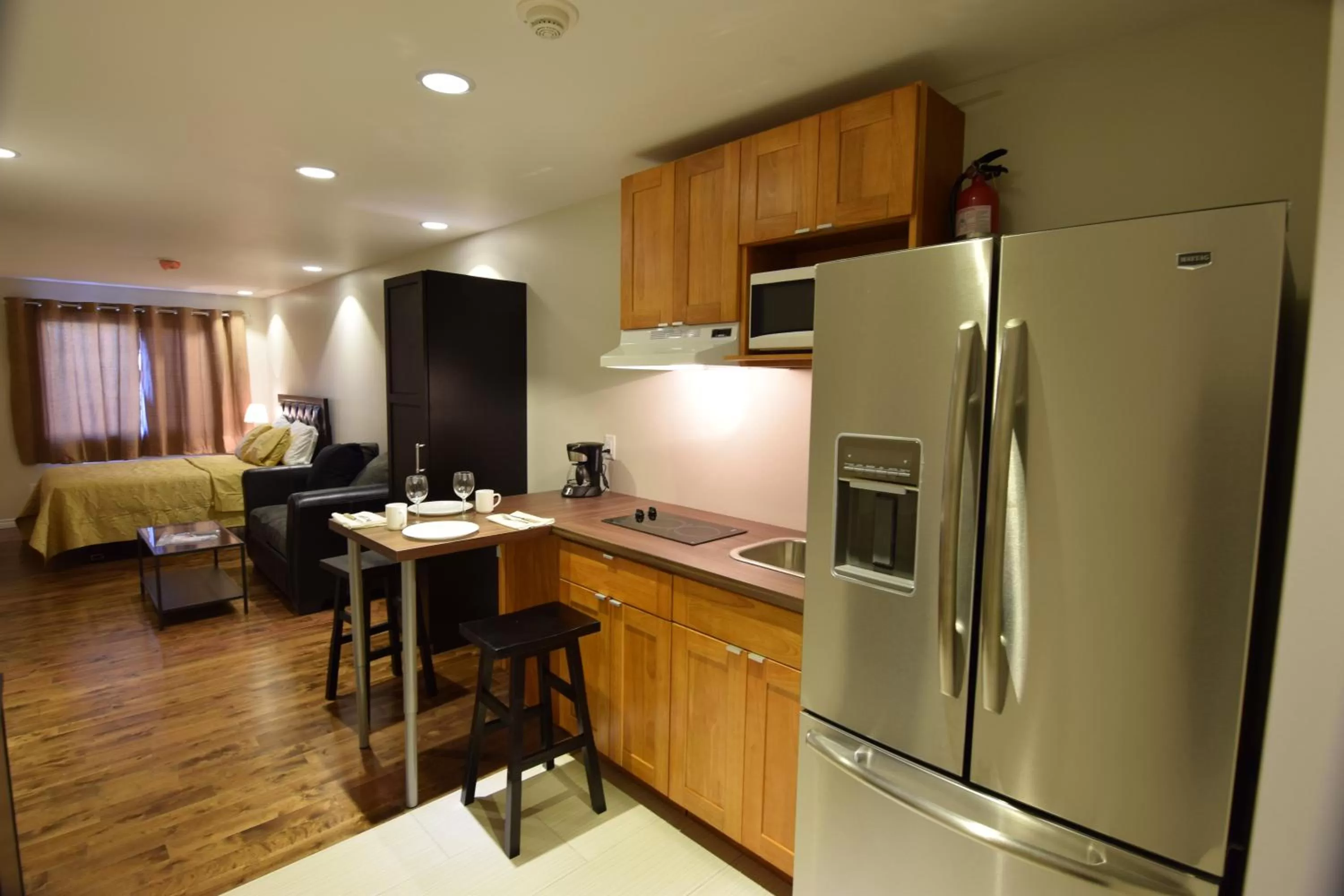 Kitchen or kitchenette in The Lion Inn & Suites