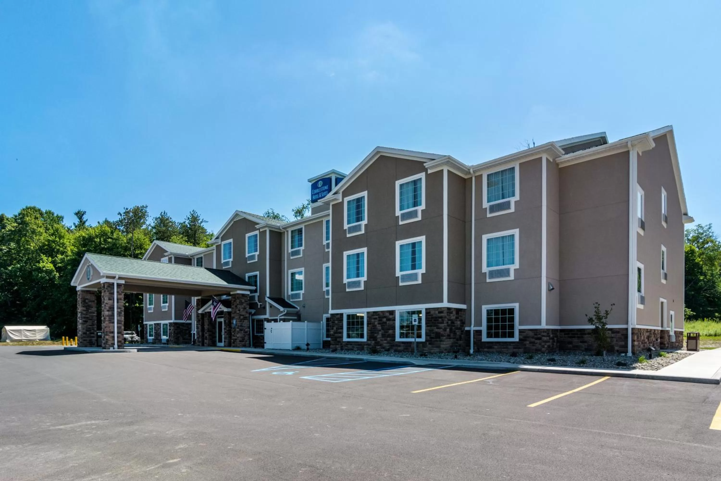Property building in Cobblestone Hotel & Suites - Greenville