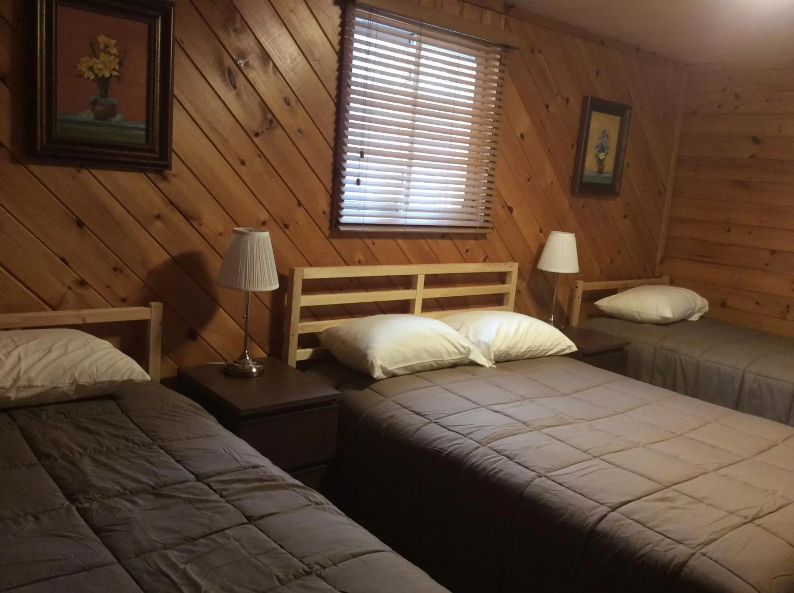 Bed in Madawaska Lodge