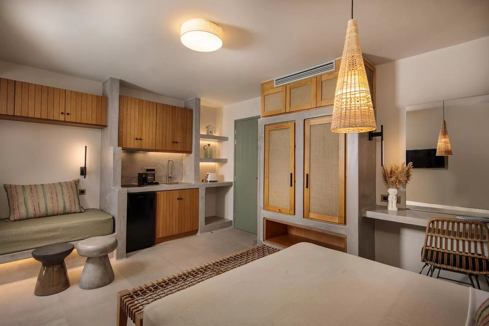 Bed, Kitchen/Kitchenette in Makava Suites Naxos