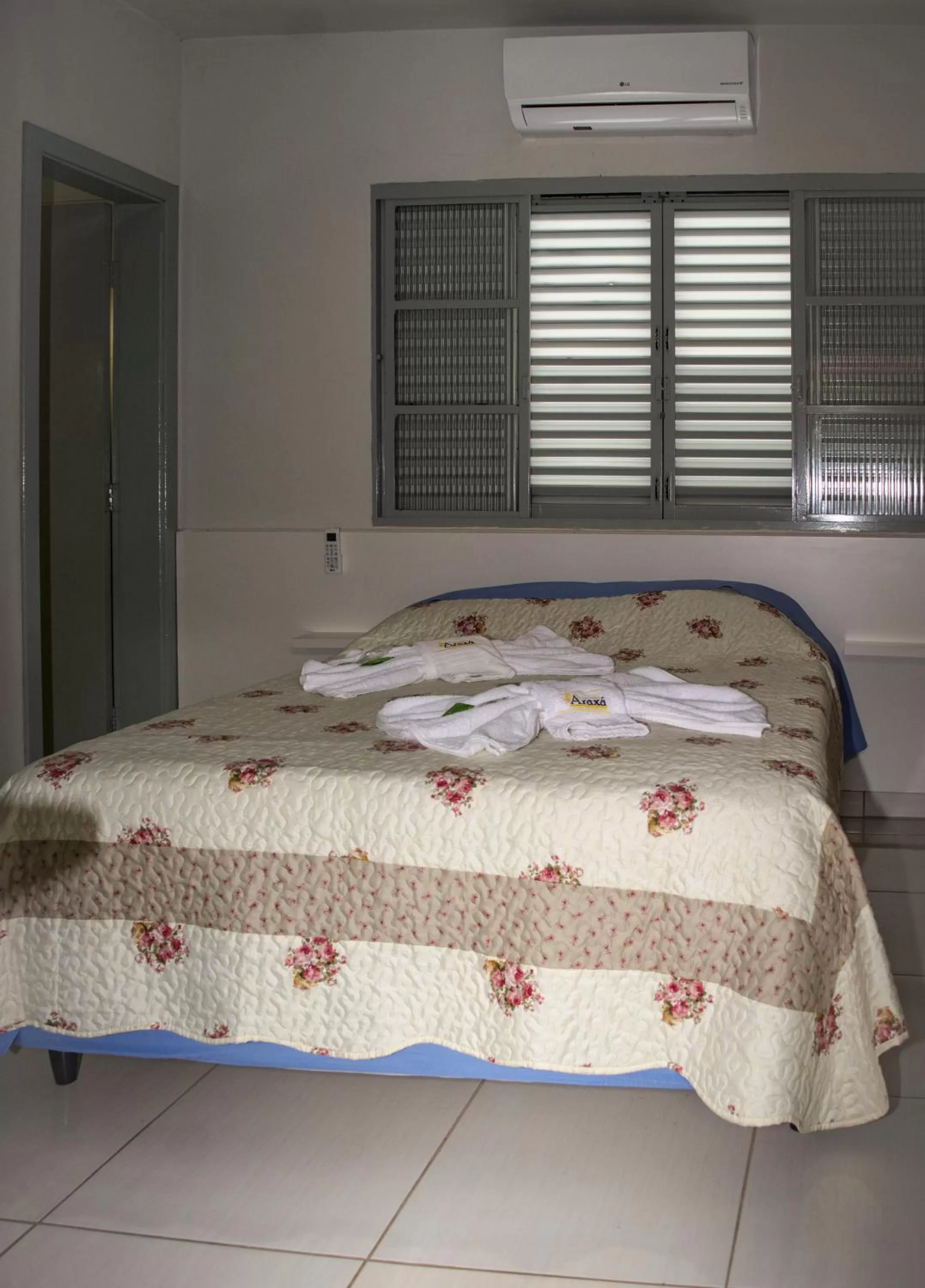 Bed in Pousada Araxá