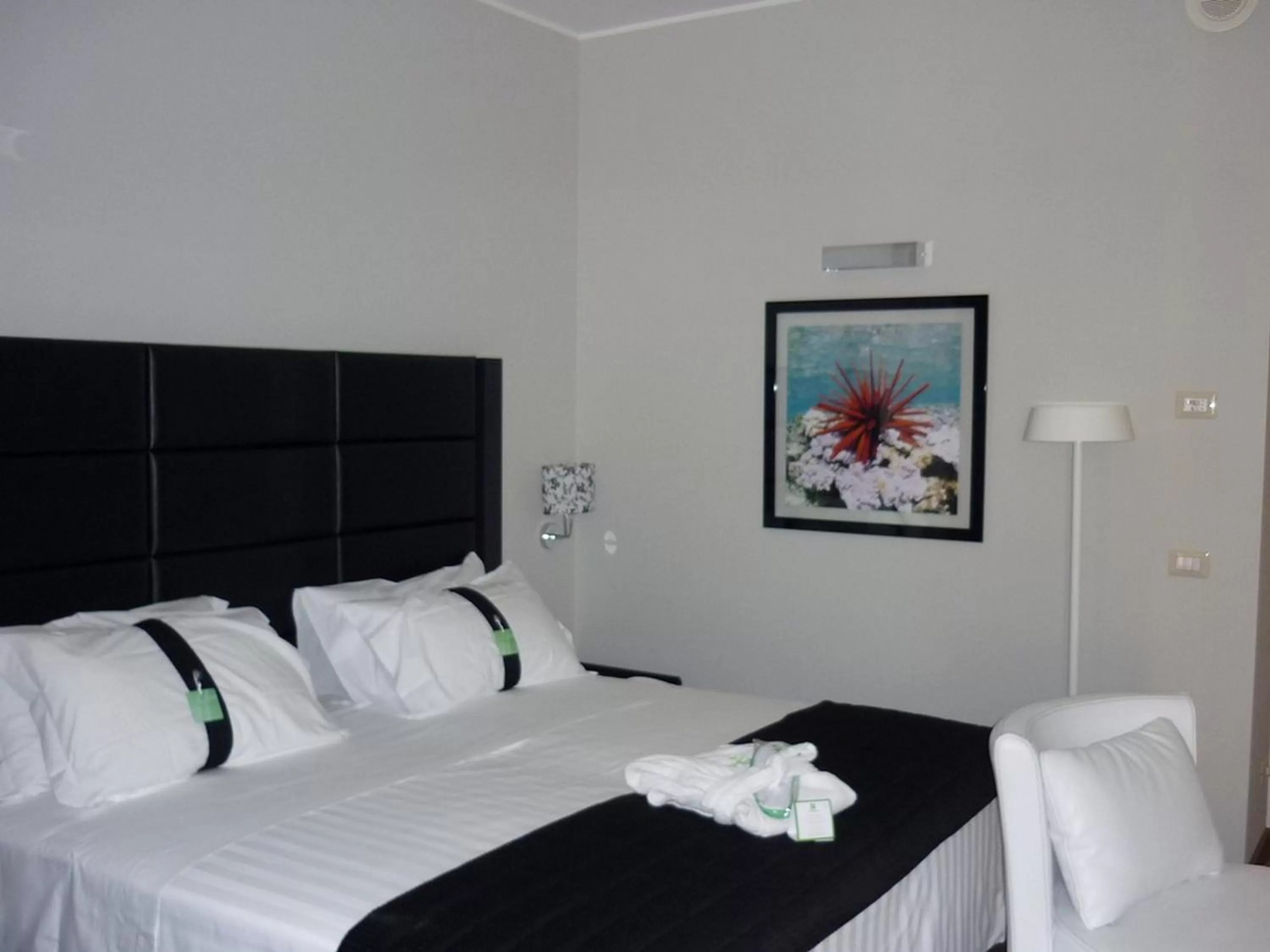 Photo of the whole room, Bed in Holiday Inn Genoa City by IHG