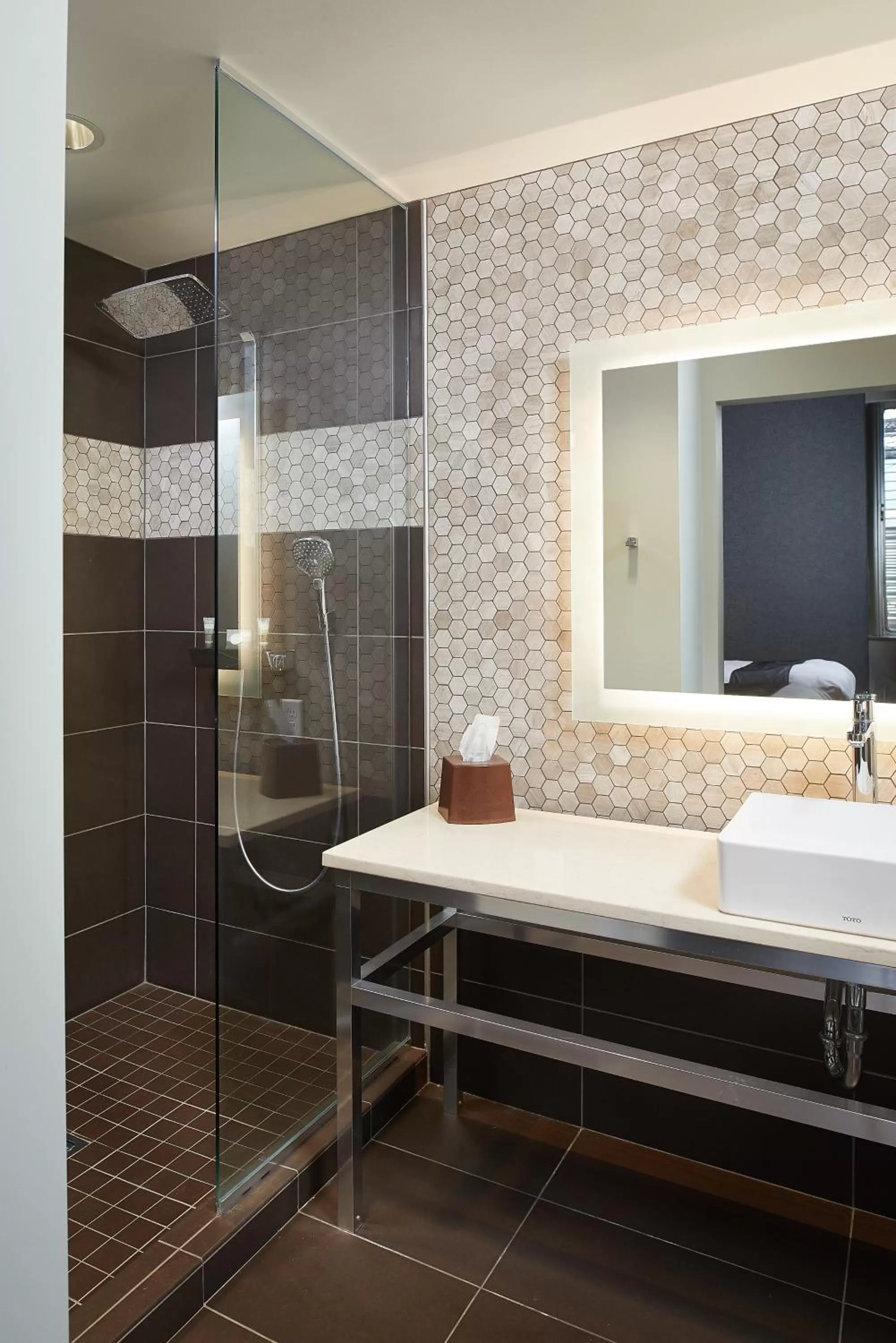 Bathroom, Bed in CityFlatsHotel - Grand Rapids, an Ascend Collection Hotel