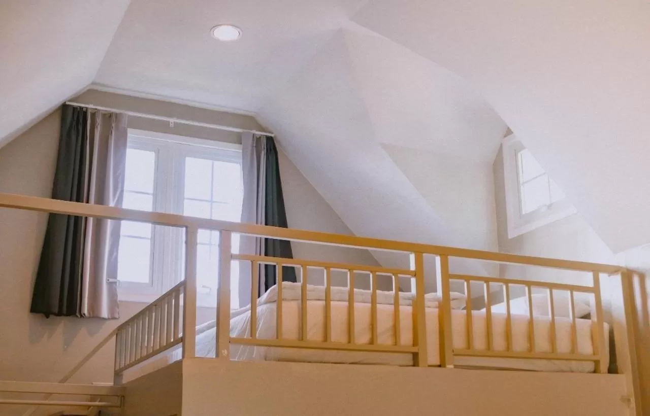 Bed in Baan JaoKorKluay บ้านเจ้ากอกล้วย