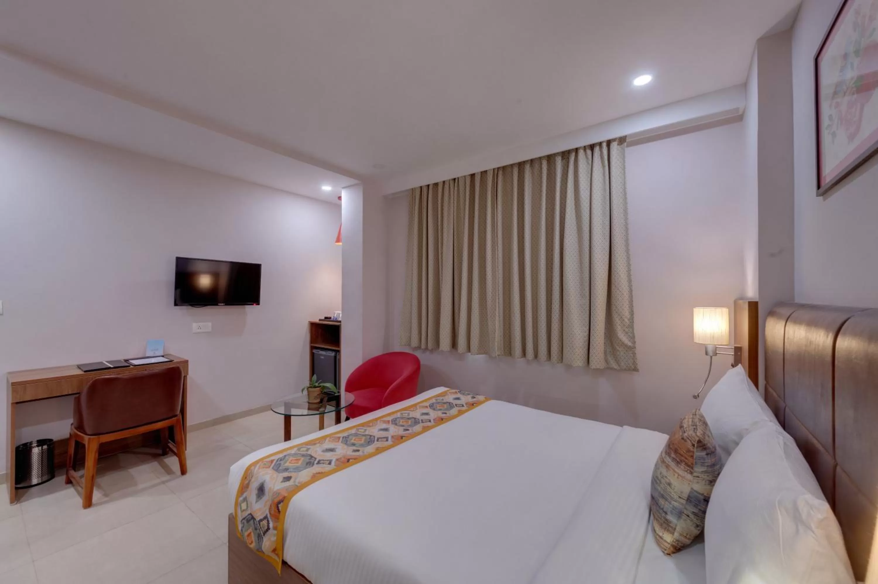 Bed in The Beacon Hotel Vadodara