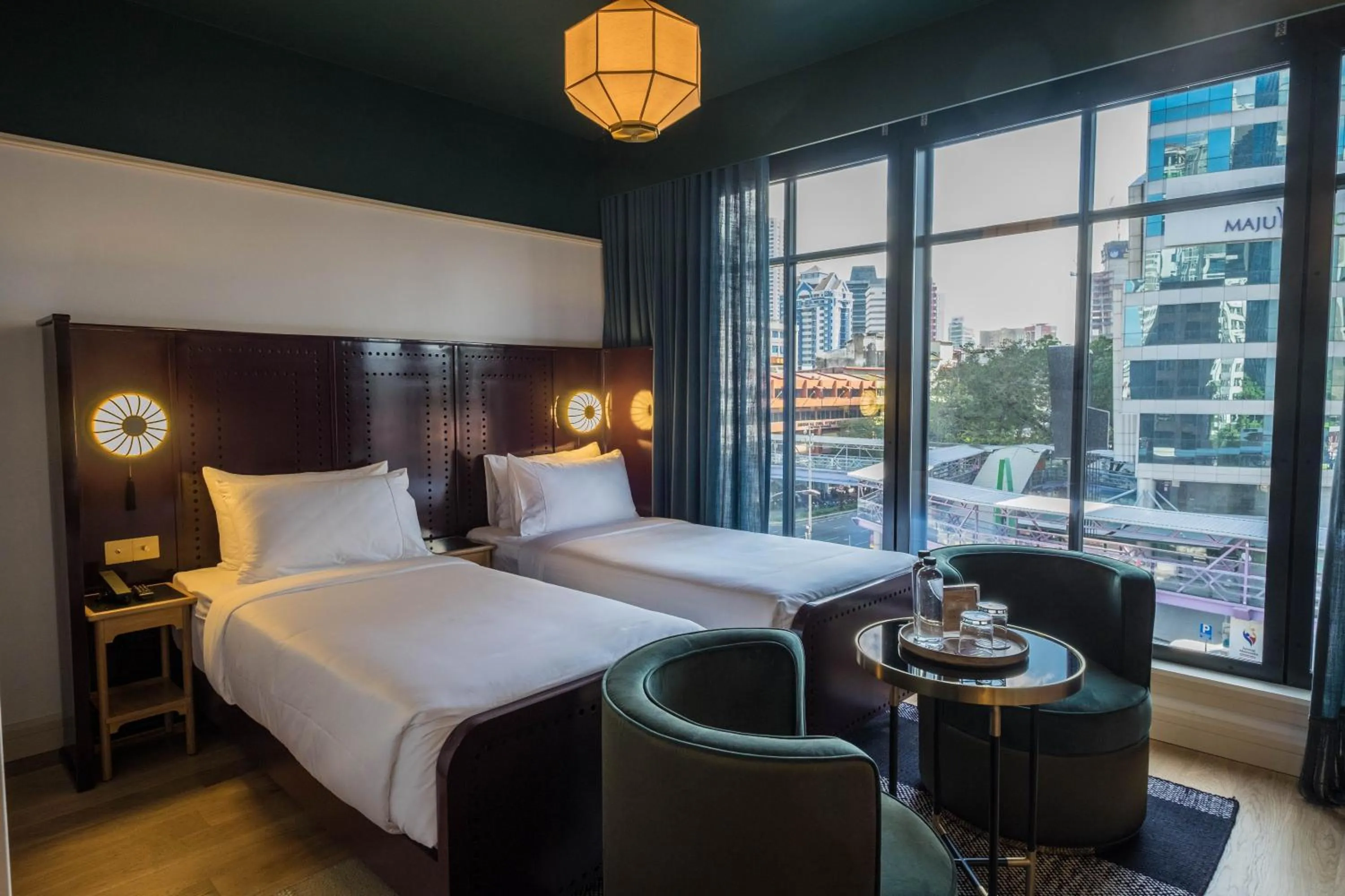 Living room, Bed in The Chow Kit - an Ormond Hotel