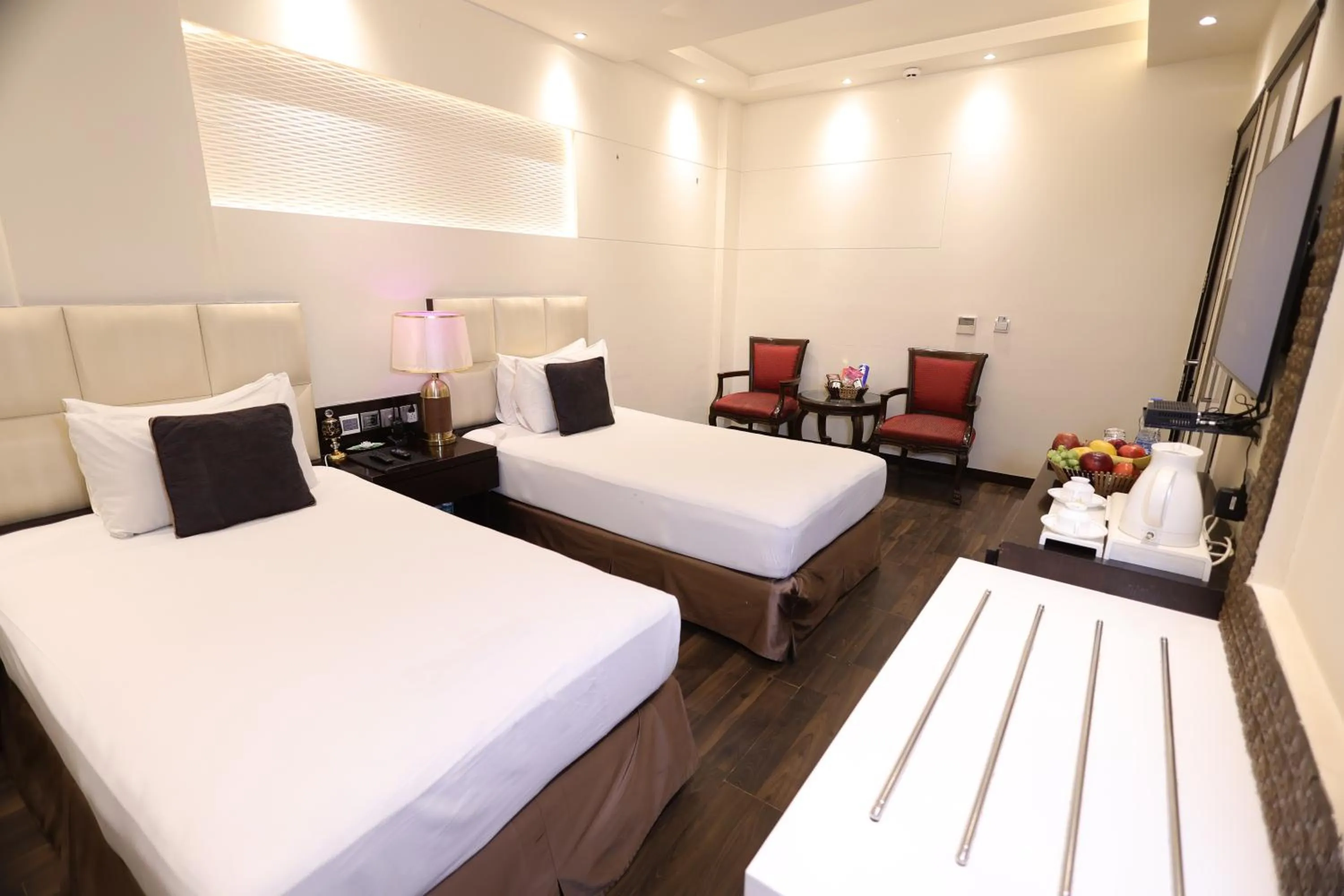 Photo of the whole room, Bed in Hotel Grand Godwin - Near New Delhi Railway Station - Paharganj