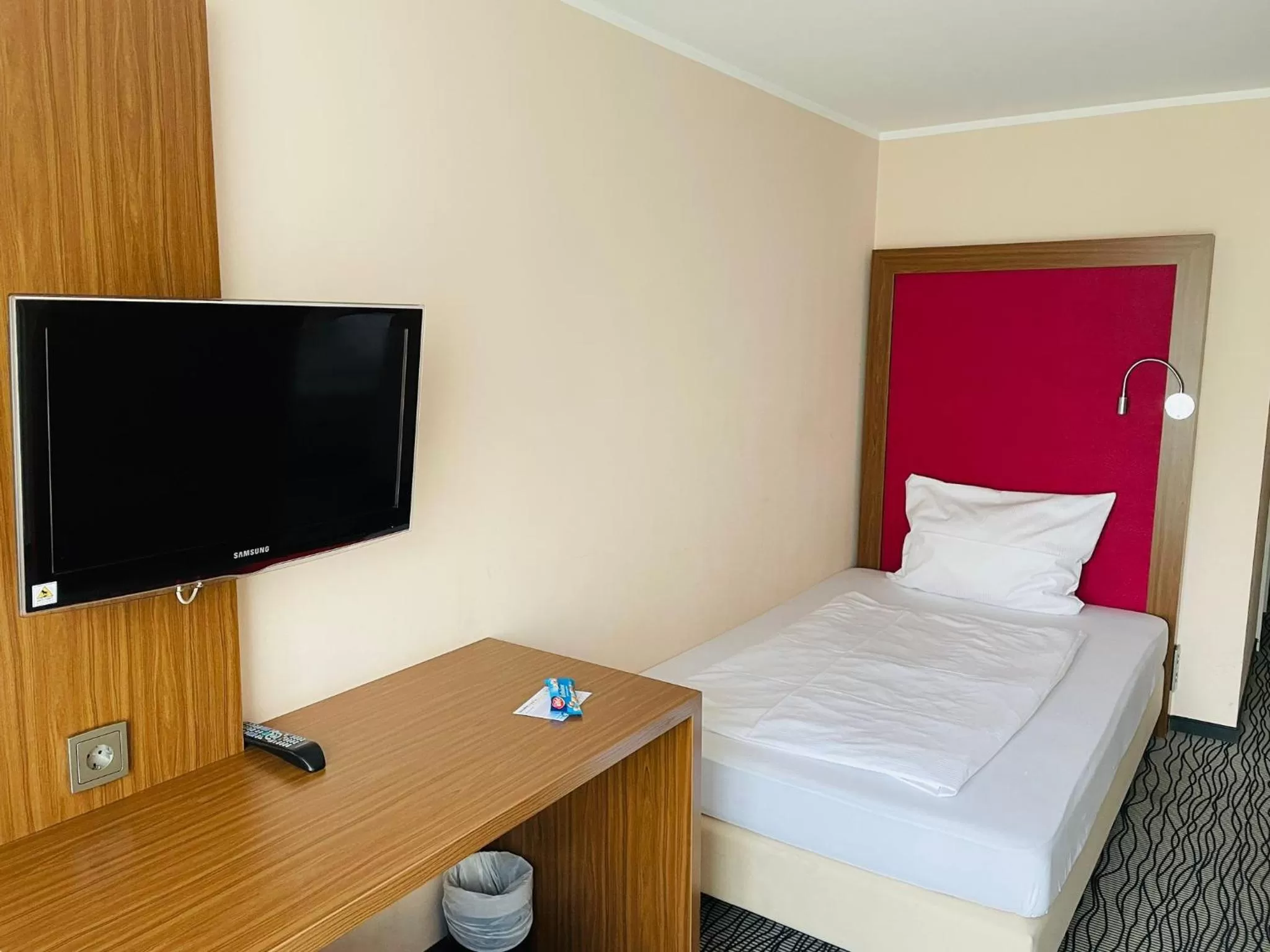 Bed in Point Hotel Apartments and Rooms