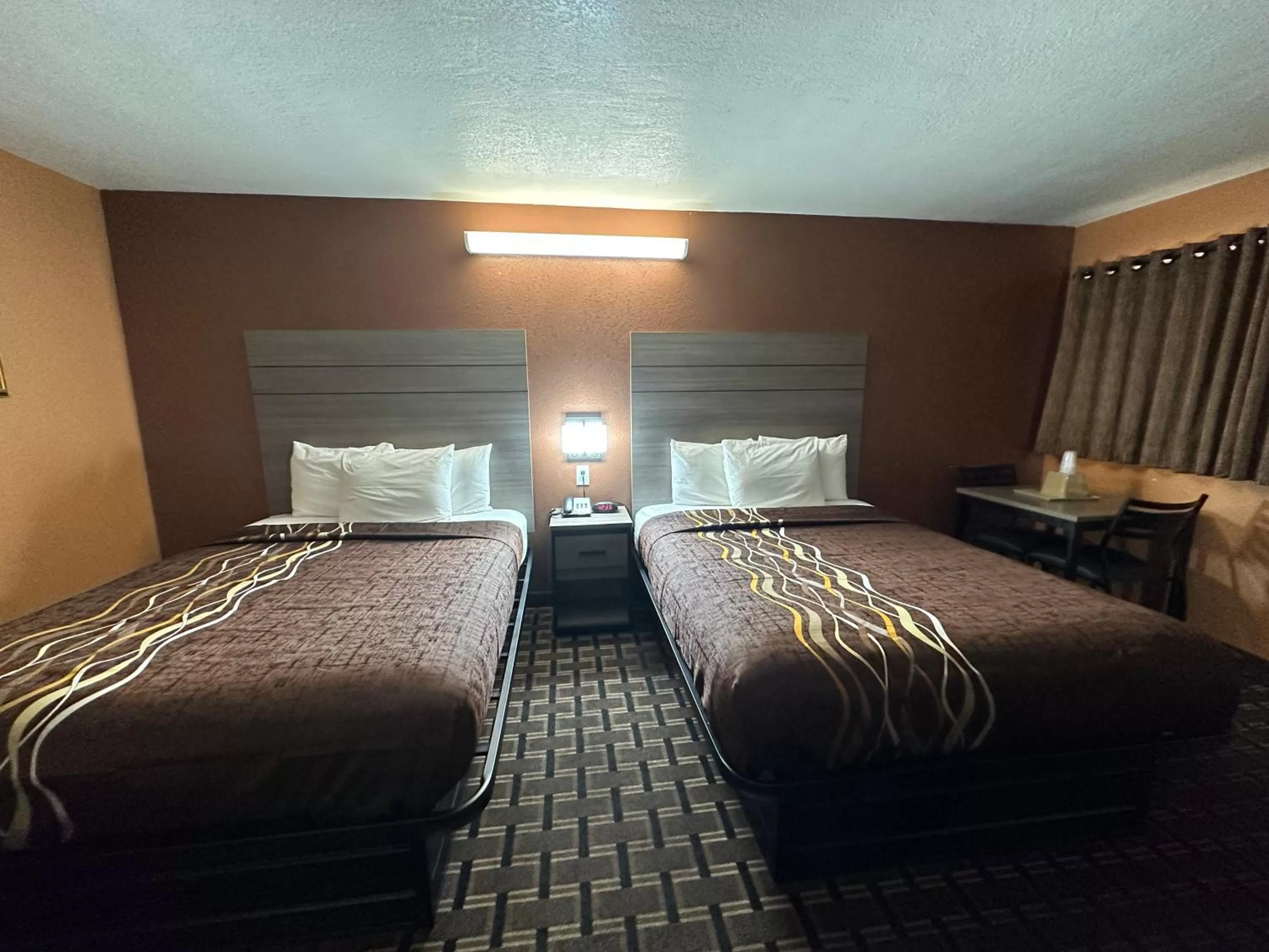 Bed in New Corral Motel