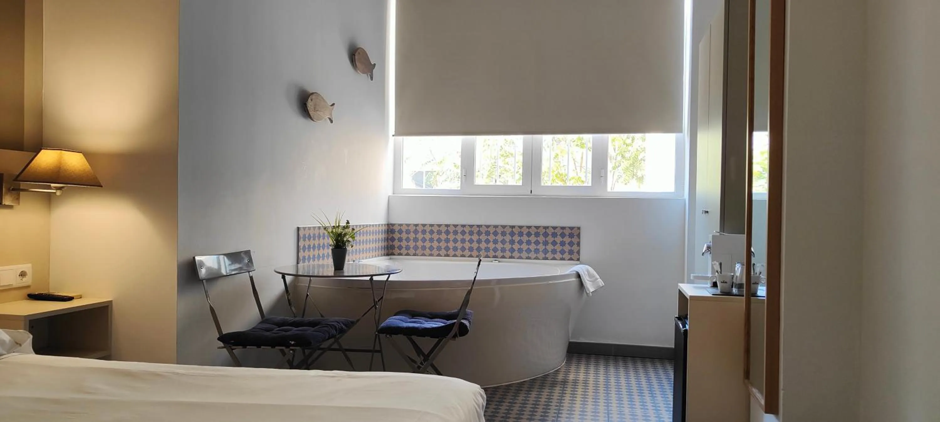 Bed in Hotel San Lorenzo Boutique Plaza