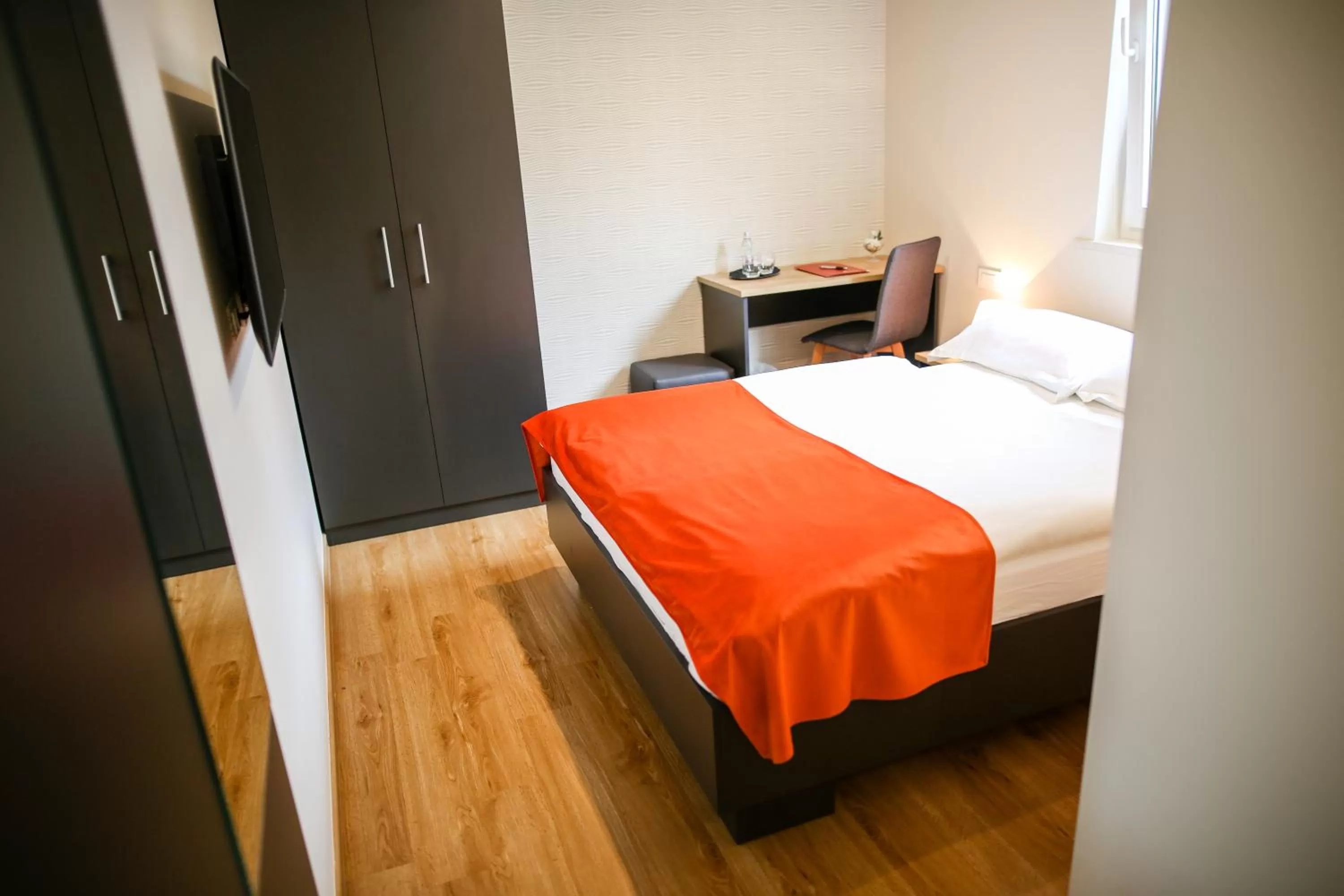 Bed in Ambient Hotel