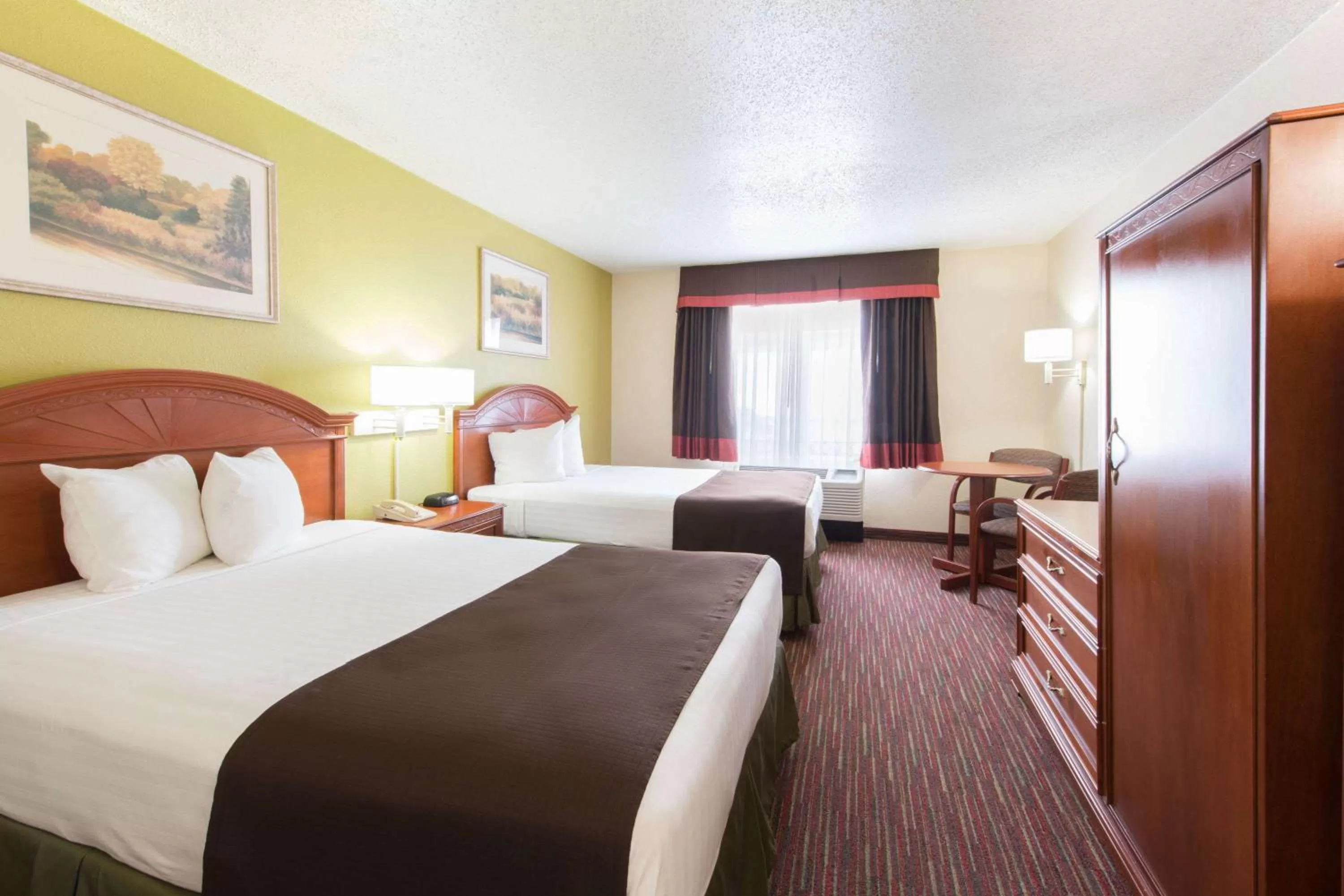 Photo of the whole room, Bed in Baymont by Wyndham Louisville East