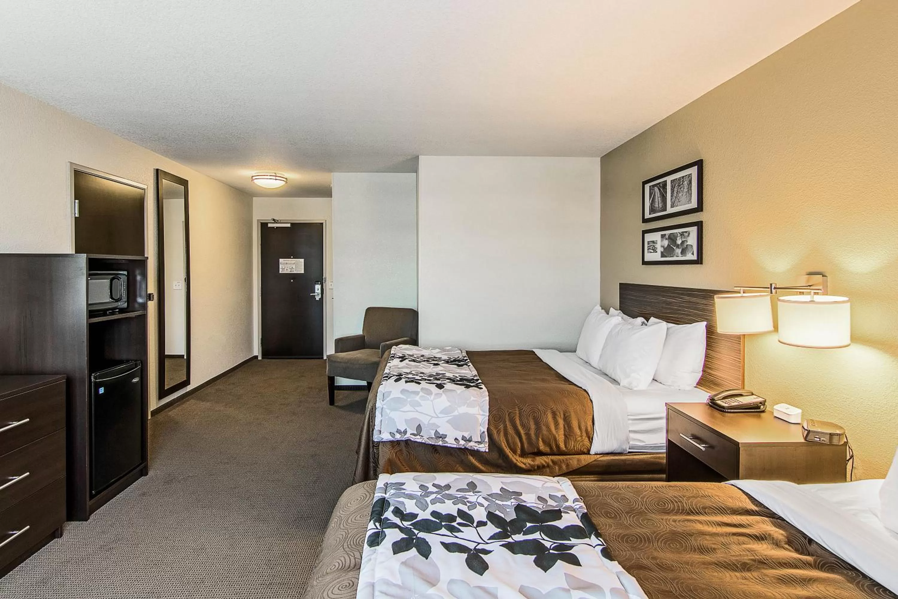 Photo of the whole room, Bed in Sleep Inn & Suites West-Near Medical Center