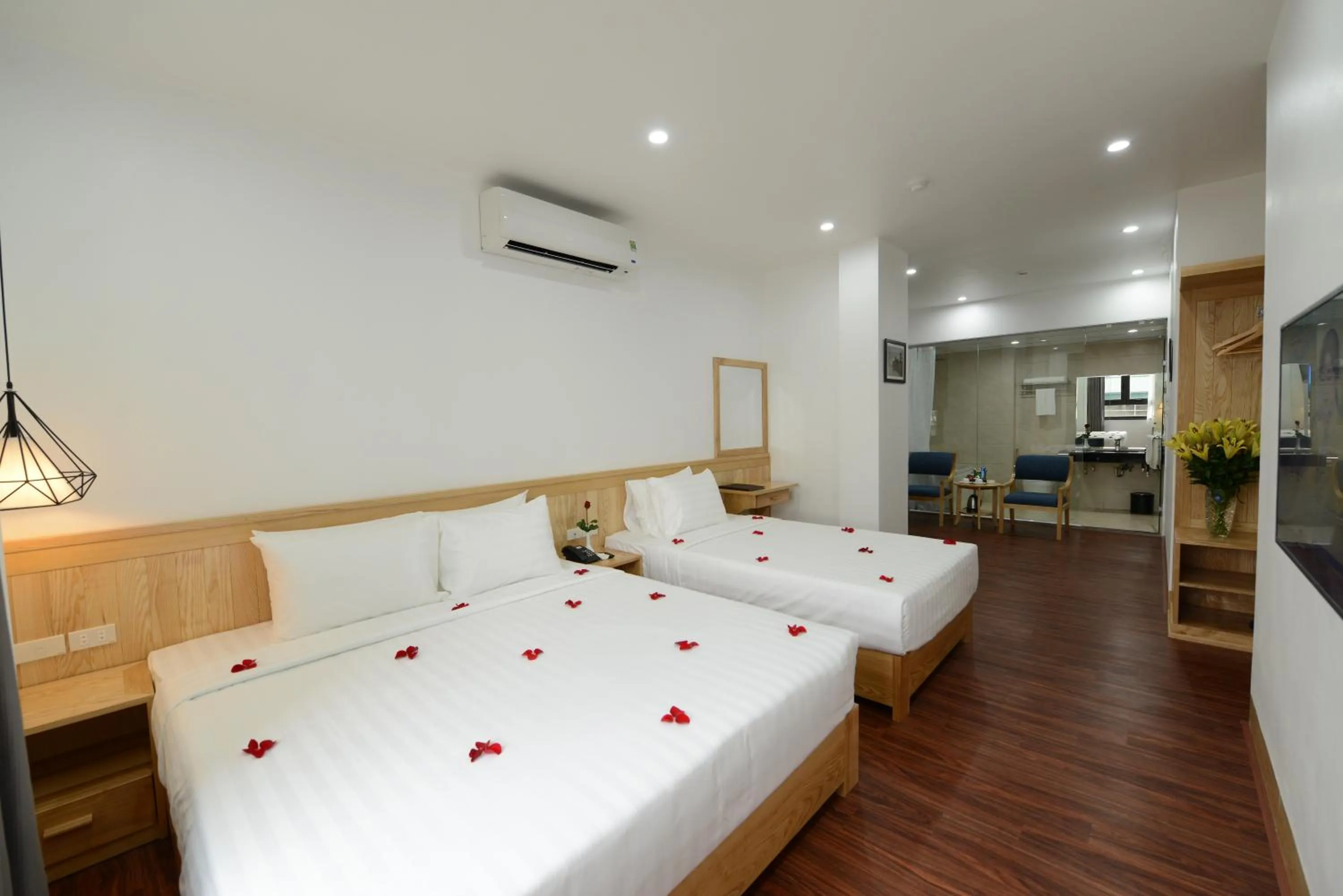 Bed in Blue Hanoi Inn City Hotel