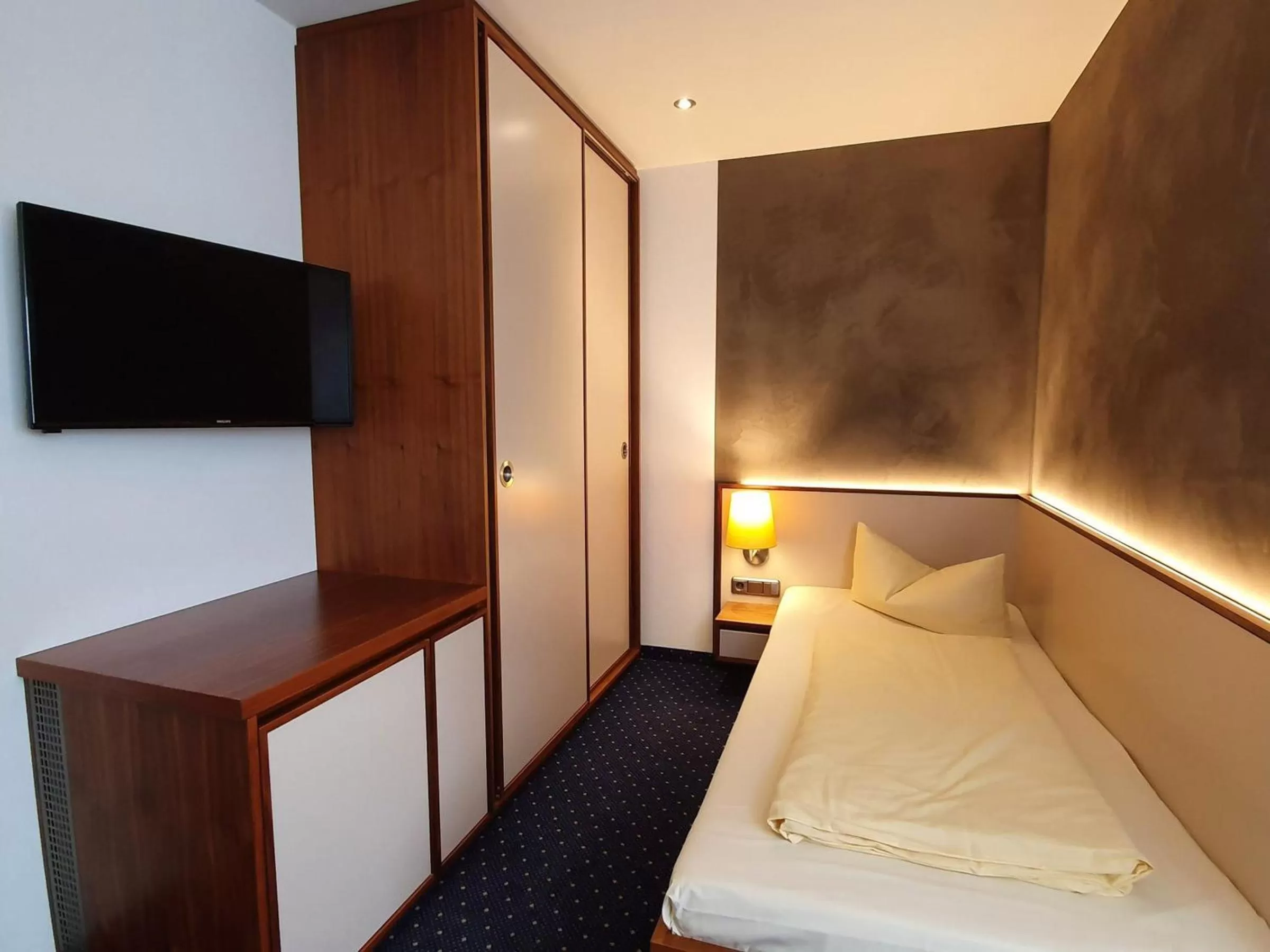 Bed in Hotel Restaurant Adler