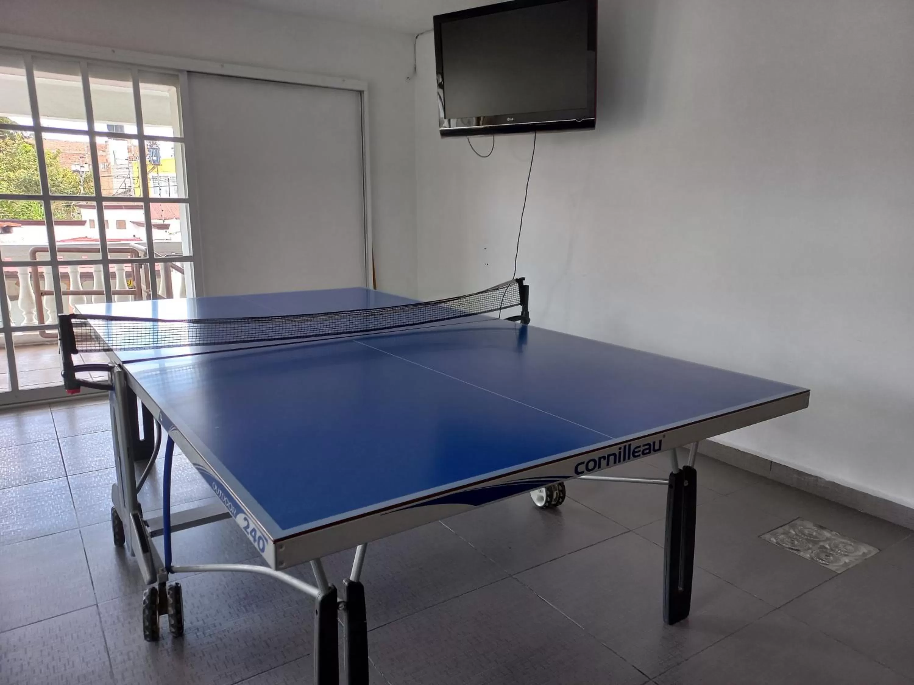Table tennis in La Aurora Hotel Like Home