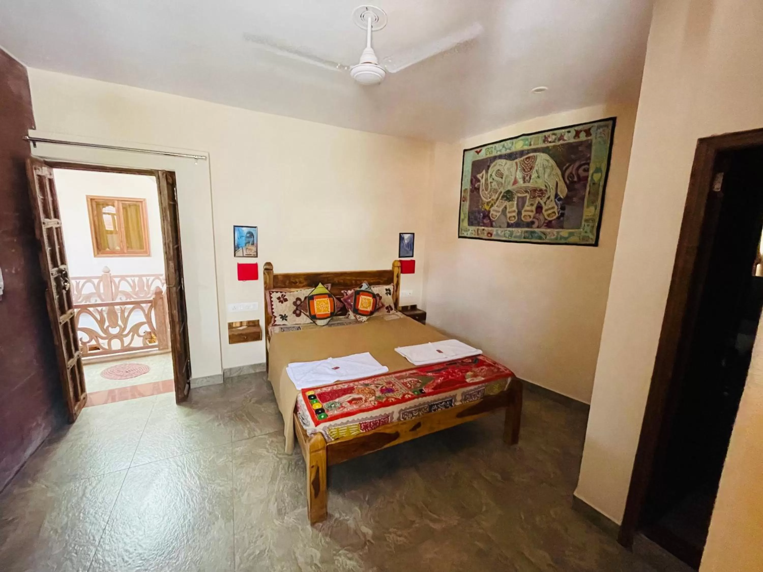 Photo of the whole room, Bed in Corsican Haveli